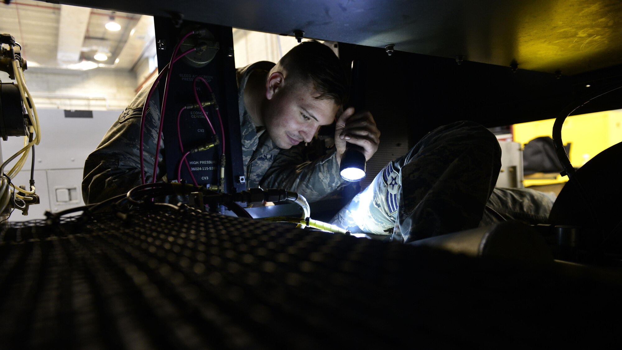 Airman 1st Class Nathan Wylie, 31st Maintenance Squadron Aerospace Ground Equipment apprentice, helps troubleshoot a problem during an advanced maintenance course, Jan. 31, 2017, at Aviano Air Base, Italy. The course is a mandated Air Force maintenance class to provide maintenance Airmen advanced repair techniques. (U.S. Air Force photo by Senior Airman Cary Smith)