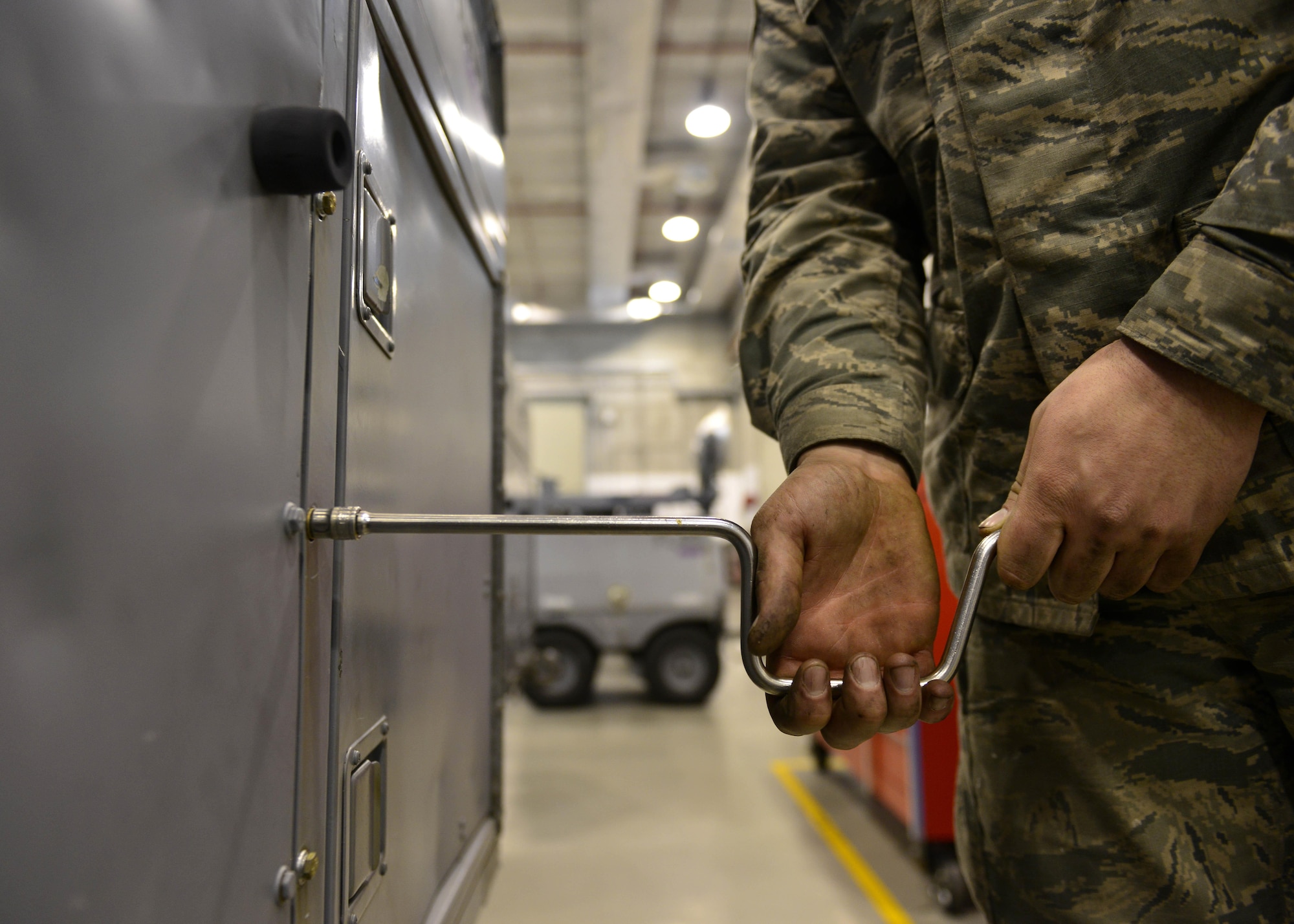 Airman 1st Class Nathan Wylie, 31st Maintenance Squadron Aerospace Ground Equipment apprentice, tightens a bolt on a container after troubleshooting a maintenance repair problem, Jan. 31, 2017, at Aviano Air Base, Italy. The maintenance course require Airmen to find problems, troubleshoot and fix the malfunctions. (U.S. Air Force photo by Senior Airman Cary Smith)