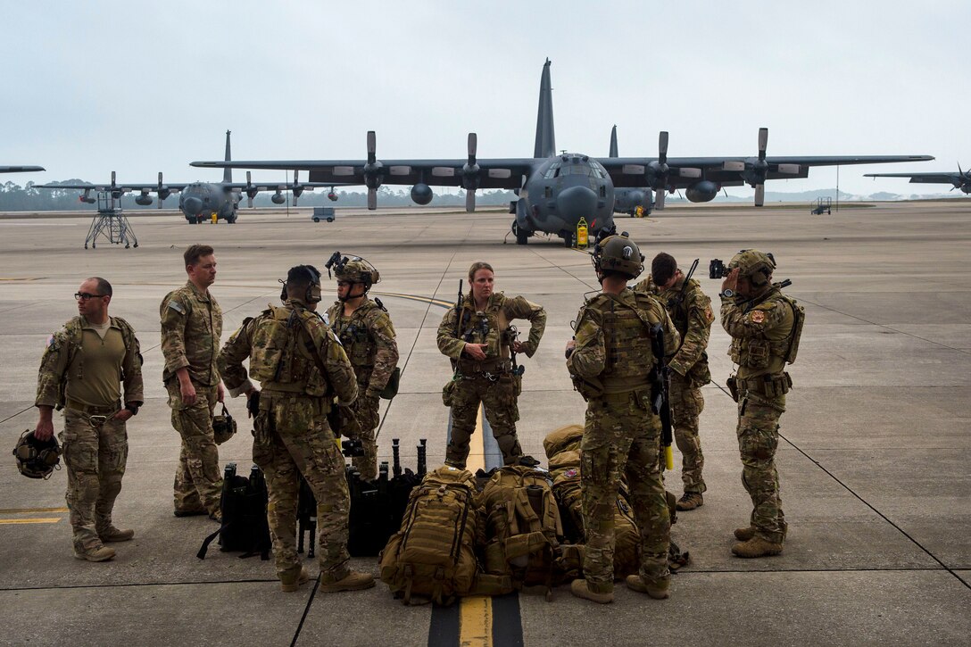 Airmen receive a mission breifing during exercise Emerald Warrior 17 at Hurlburt Field, Fla., March 1, 2017. The airmen are special operations surgical team medics assigned to the 720th Operations Support Squadron. Emerald Warrior is a U.S. Special Operations Command exercise where joint special operations forces train to respond to various threats. Air Force photo by Airman 1st Class Keifer Bowes