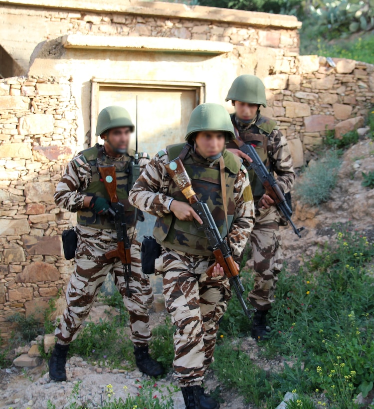 Members of Morocco's special operations forces methodically clear buildings as part of a direct action raid, 3 March 2017, during Exercise Flintlock 2017. The operators partnered with Marines from U.S. Marine Corps Forces, Special Operations Command throughout the exercise in order to build interoperability and support their common goal of countering violent extremism across the region. (U.S. Marine Corps photo by Maj. Nick Mannweiler, released)