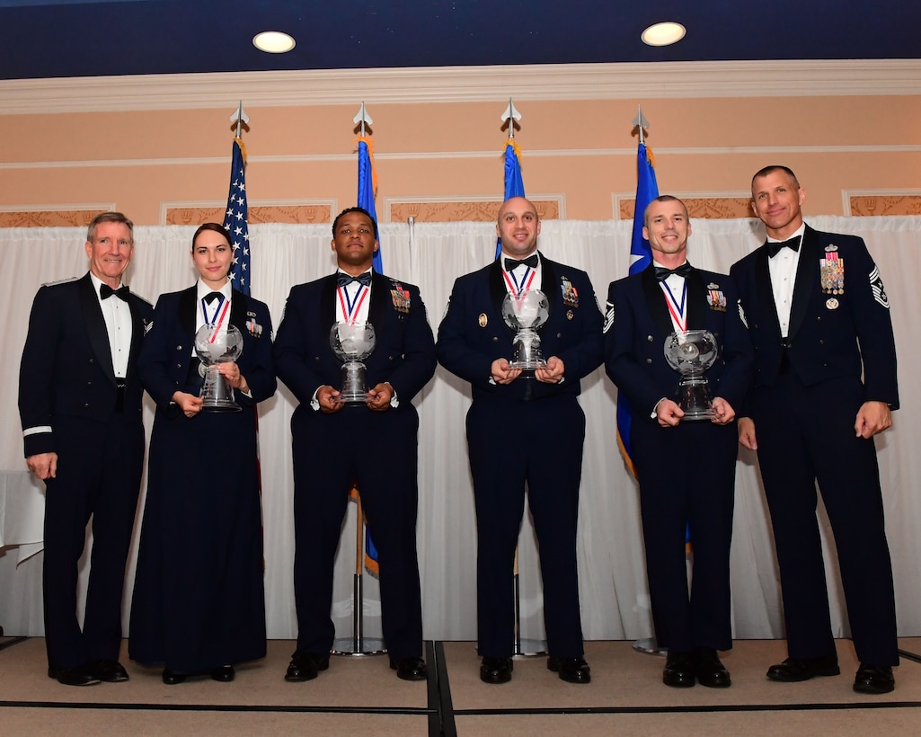 Air Combat Command’s 2017 Outstanding Airmen of the Year nominations stand on stage during a banquet at the Bayview Community Center at Langley AFB, Virginia, March 8, 2017. ACC’s nominees will represent their command and will compete at the Air Force level. The award recognizes 12 outstanding enlisted service members for superior leadership, job performance, community involvement and personal achievements. (U.S. Air Force photo by Staff Sgt. Nick Wilson)