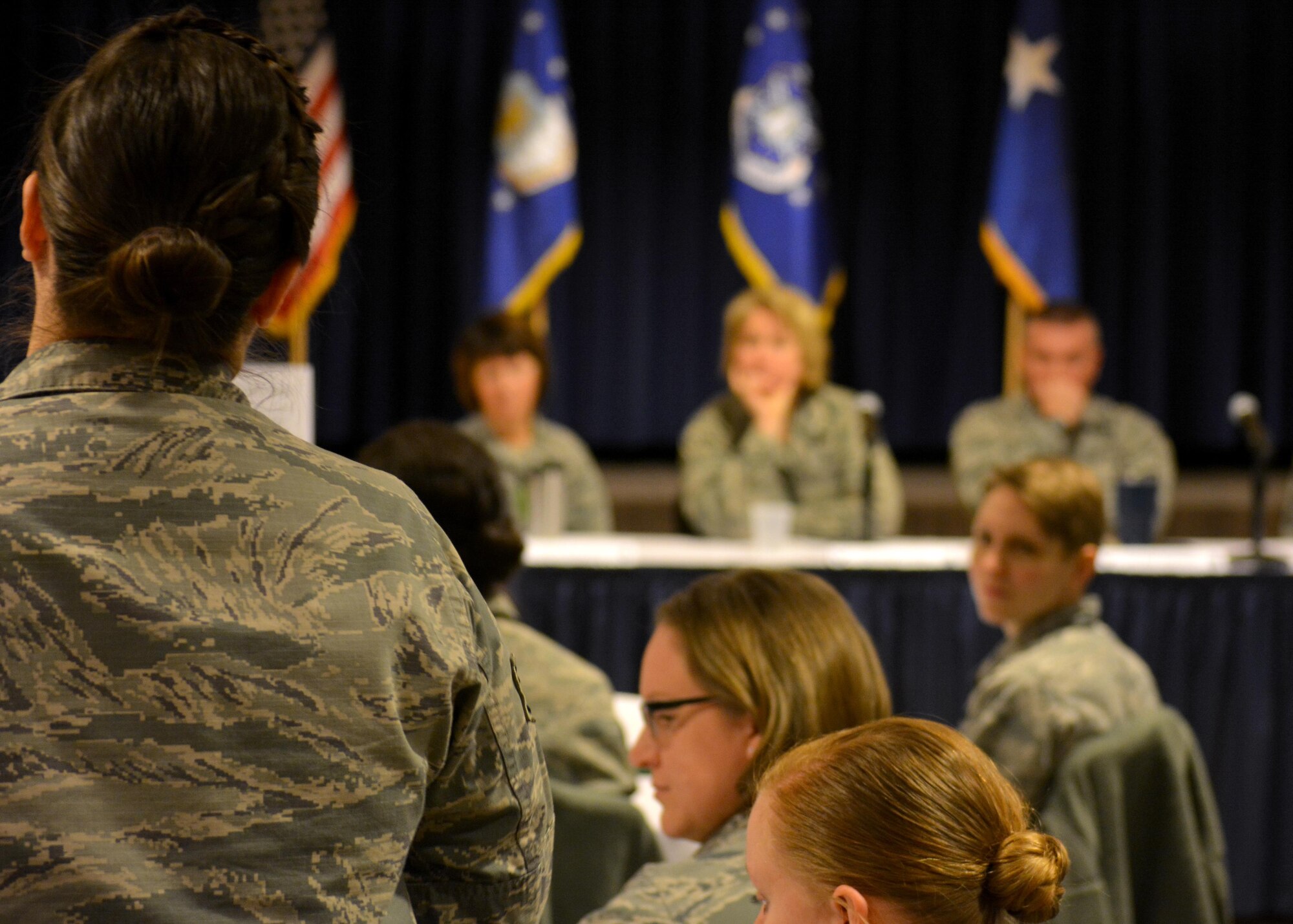 PETERSON AIR FORCE BASE, Colo. -- Airmen attending the Women's Leadership Symposium at the Peterson Club on Tuesday, Mar. 7th, 2017, participate in an active panel discussion with Air Force leaders. Attendees came from a variety of bases, including Buckley, Peterson, Schriever, Vandenberg and Cheyenne Mountain. (U.S. Air Force photo/Senior Airman Laura Turner)