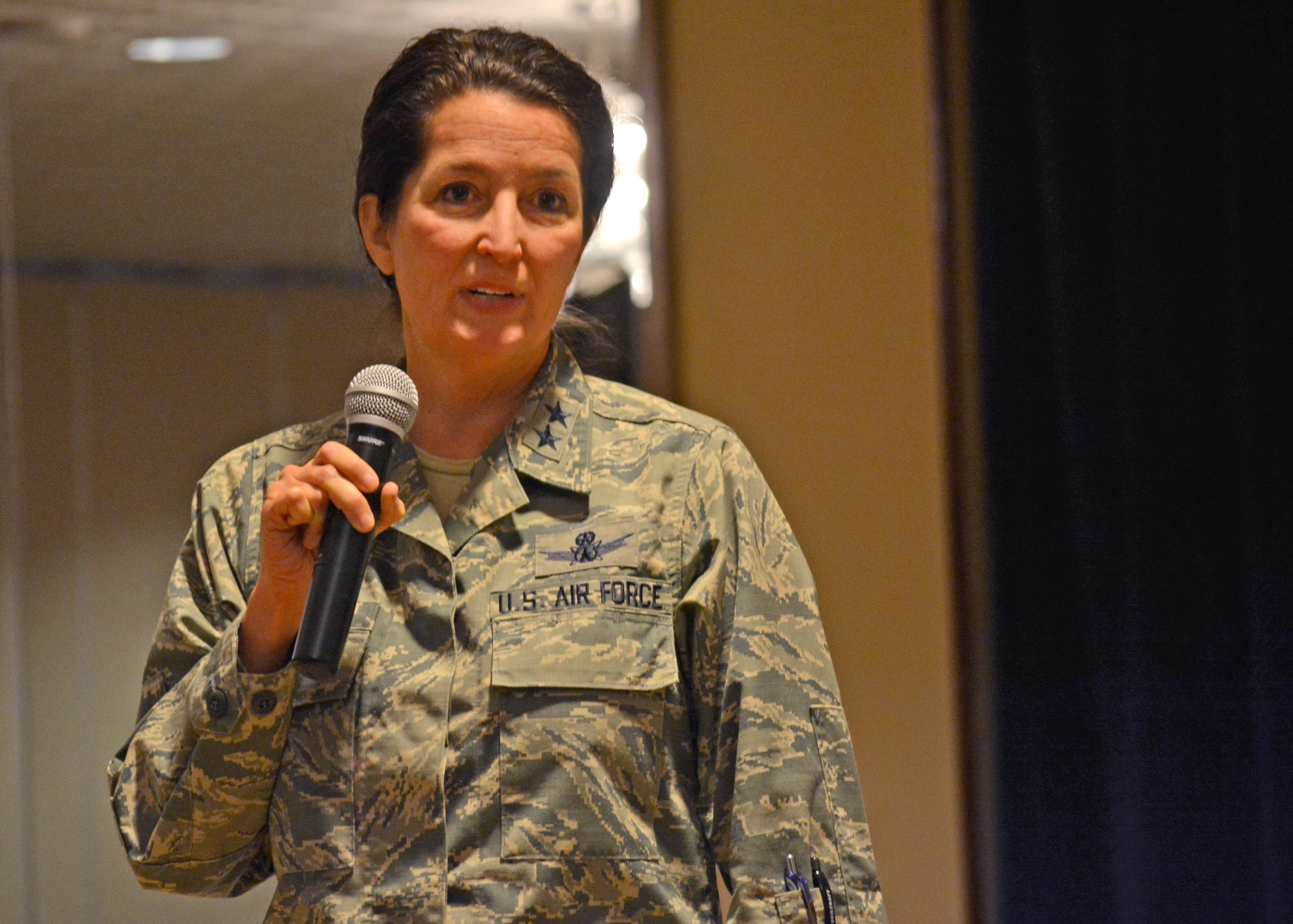 PETERSON AIR FORCE BASE, Colo. -- Maj. Gen. Nina Armango, Director of Strategic Plans, Programs, Requirements and Analysis, Headquarters Air Force Space Command, speaks to Airmen and civilians attending the Women's Leadership Symposium at the Peterson Club on Wednesday, Mar. 8th, 2017. Attendees came from a variety of bases, including Buckley, Peterson, Schriever, Vandenberg and Cheyenne Mountain. (U.S. Air Force photo/Senior Airman Laura Turner)