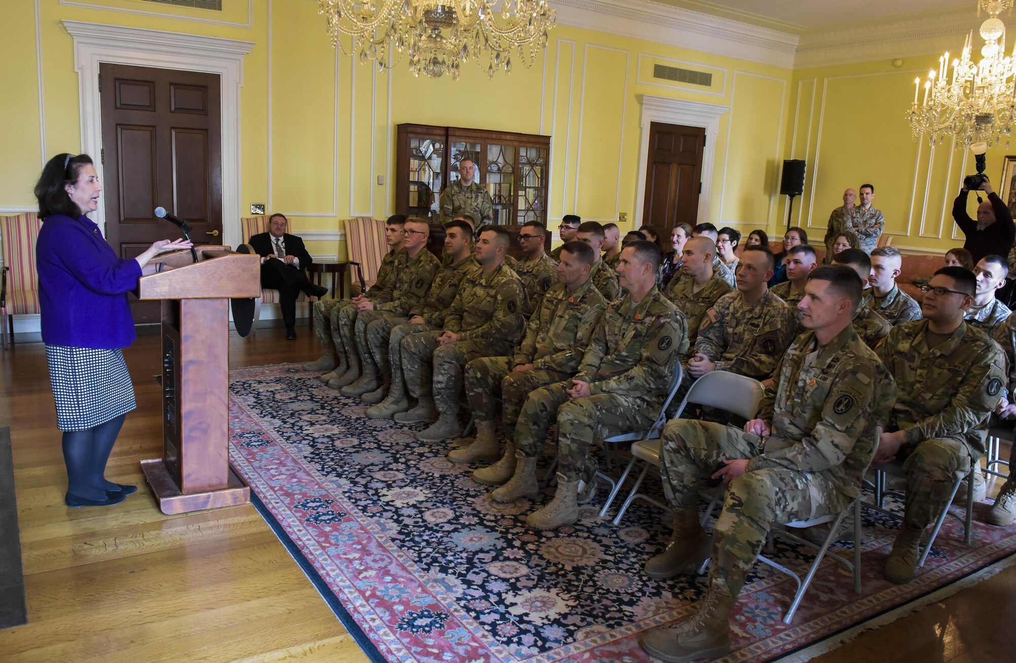 Deputy Archivist for the National Archives and Records Administration (NARA) Ms. Debra Steidel Wall, thanked members of the Joint Records Team (JRT) for their months of hard work in preparing and moving materieals from President Obama's administration during a ceremony at the National Archives Headquarters building, Washington, D.C., Feb. 22, 2017. The JRT was made up of Airmen assigned to the Air Force District of Washington (AFDW) and Soldiers from the U.S. Army's 3rd Infantry Division "The Old Guard" worked in concert with Presidential Material Handlers from the NARA over several months to ensure the safe movement of the records and artifacts gathered during the eight years of President Obama's administration. The JRT was tasked with helping to inventory, prepare for shipping, palletize and load several tons of paper records, terabytes of electronic records, and thousands of artifacts. Along with several truck shipments the bulk of the materials were loaded onto and Air Force C-5 Galaxy cargo aircraft brought in from Dover Air Force Base, Del., and were then flown to Chicago, Ill., where they were placed in secure storage until completion of Obama's Presidential Library. The library is part of the presidential library system, which is administered by the National Archives and Records Administration. (U.S. Air Force photo/Jim Varhegyi) (released) 