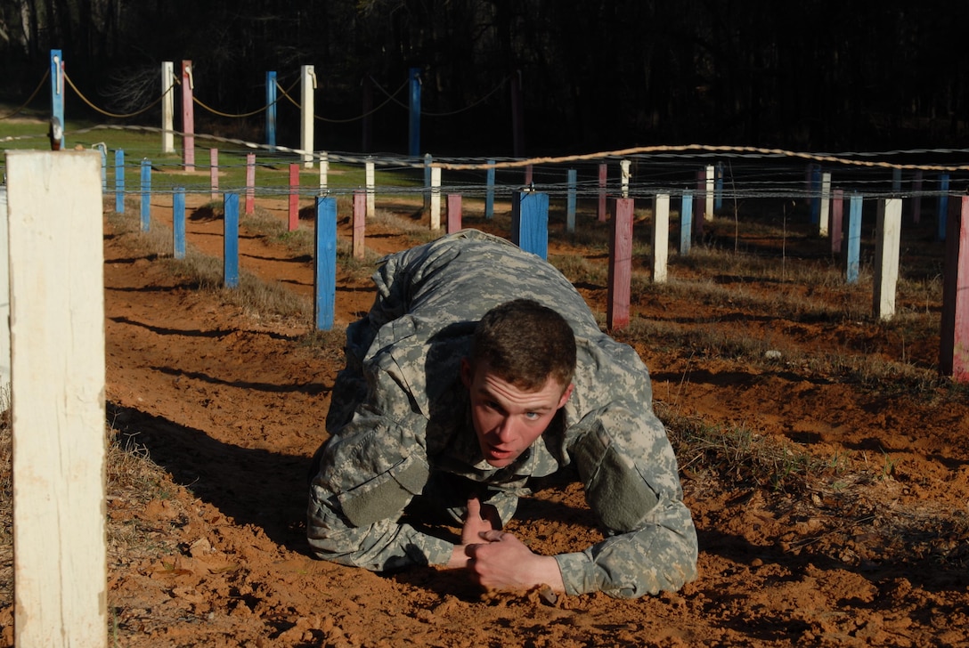 Spc. Logan A. Fowler assigned to 75th Combat Support Hospital, 3rd Medical Command (Deployment Support), competes with Soldiers from his command on the obstacle course on Mar. 4.  Fowler is one of twelve Soldiers from 3rd Med. Cmd. (DS) who arrived on March 1st, prepared to compete in the command-level Best Warrior Competition for 2017 held 1-5 March at the intellectual center of the maneuver force – Fort Benning, Georgia. The Best Warrior Competition recognizes Soldiers who demonstrate commitment to the Army values, embody the Warrior Ethos and represent the force of the future.