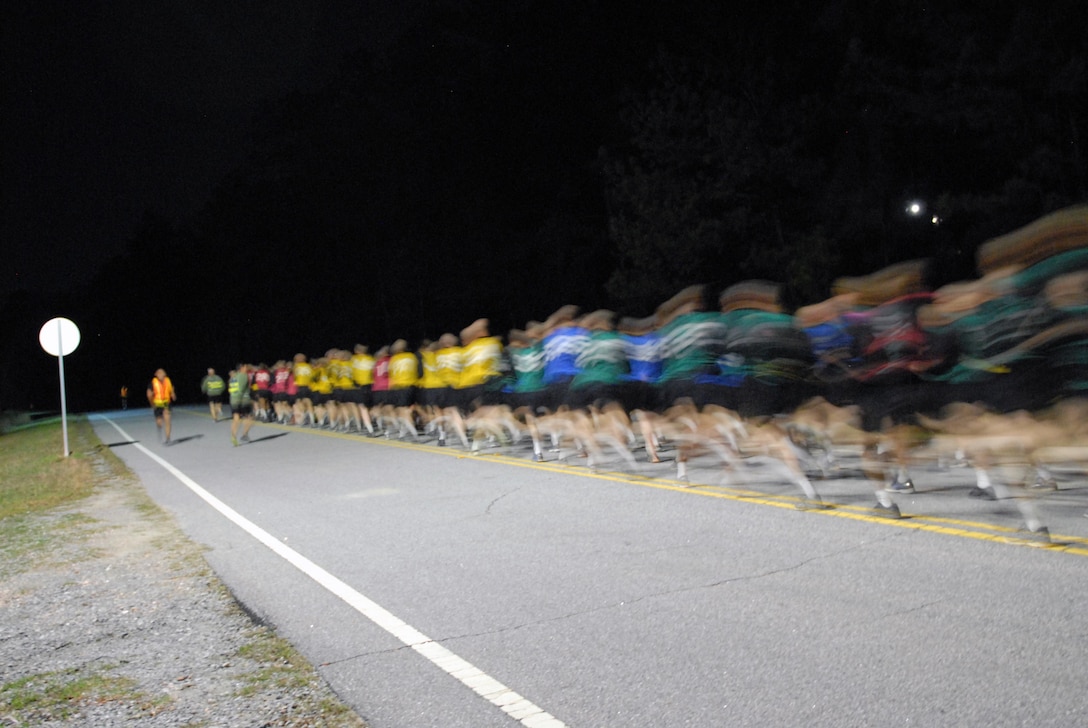 Six Soldiers from Army Reserve Medical Command and 12 Soldiers from 3rd Medical Command (Deployment Support) finish the run portion of the Army Physical Fitness Test as a nearby infantry unit conducts their early morning formation run. The Soldiers arrived on March 1st, prepared to compete in the command-level Best Warrior Competition for 2017 held 1-5 March at the intellectual center of the maneuver force – Fort Benning, Georgia. The Best Warrior Competition recognizes Soldiers who demonstrate commitment to the Army values, embody the Warrior Ethos and represent the force of the future.