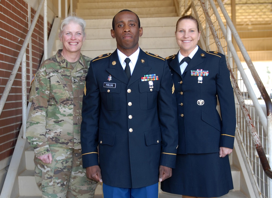 Maj. Gen. Mary Link, commanding general for Army Reserve Medical Command, and acting Cmd. Sgt. Maj. Amy Lugo join Sgt. Terrelle T. Fields, assigned to 7250th Medical Support Unit, who was selected as the Non-Commissioned Officer winner at the command-level Best Warrior Competition for 2017 held 1-5 March at Fort Benning, Georgia. The Best Warrior Competition recognizes Soldiers who demonstrate commitment to the Army values, embody the Warrior Ethos and represent the force of the future.