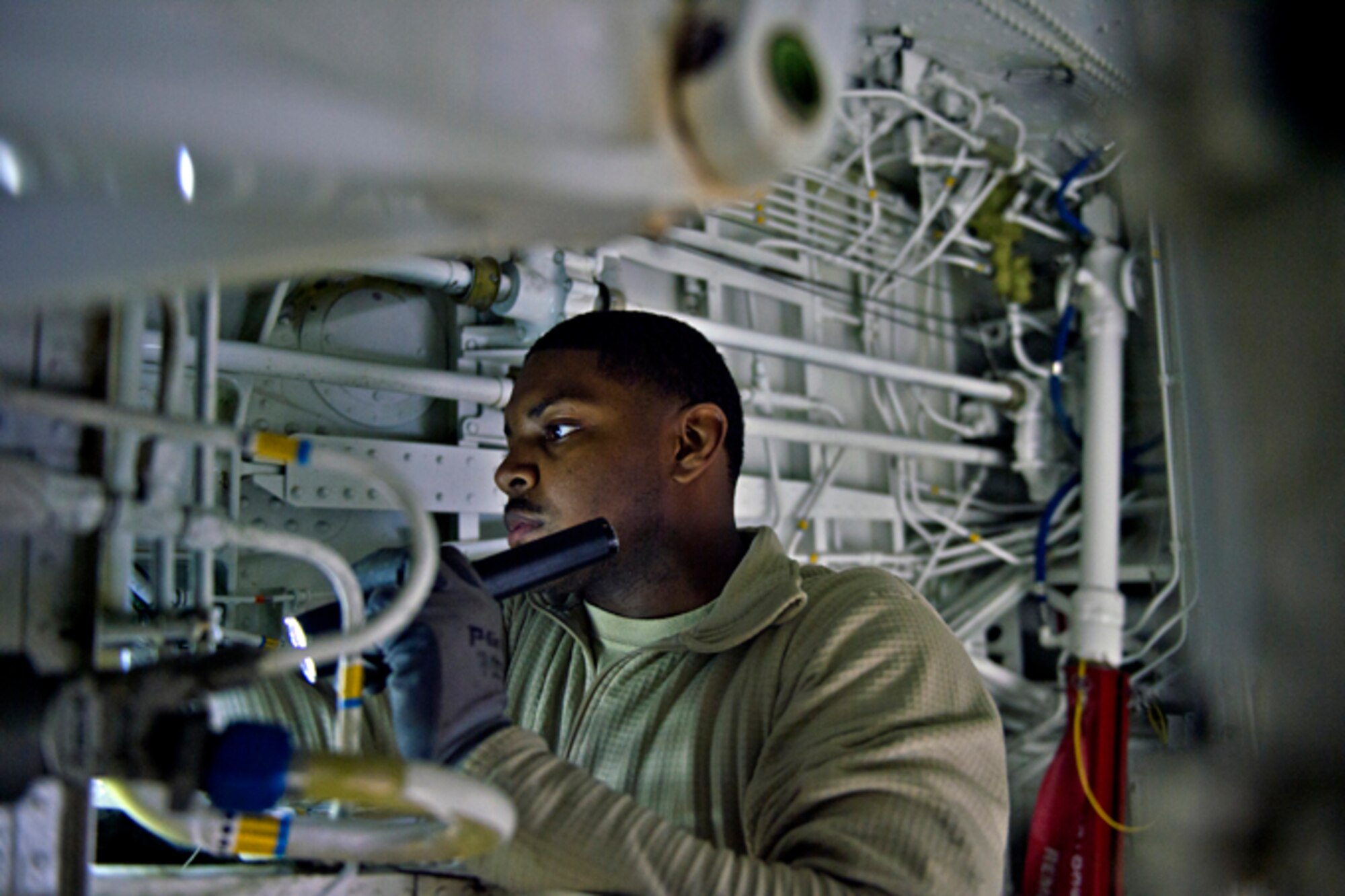 Staff Sgt. Nicholas Mcclure, 434th Maintenance Squadron aircraft mechanic, inspects fluid lines in the interior of a KC-135R Stratotanker at Grissom Air Reserve Base, Ind., March 1, 2017. The maintenance was part of an isochronal inspection, in which every system on the aircraft is inspected for damage and signs of wear once every two years. (U.S. Air Force photo/Senior Airman Harrison Withrow)
