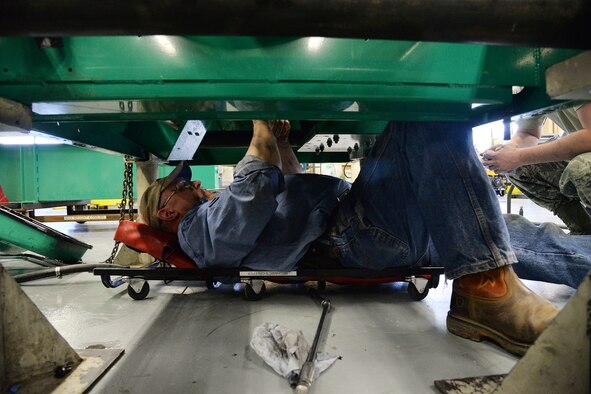 Eric Brewer, 341st Civil Engineer Squadron power support systems mechanic, works on a launch facility emergency generator March 7, 2017, at Malmstrom Air Force Base, Mont. Brewer is tasked with tearing down and rebuilding the emergency generators, sometimes even from scratch. (U.S. Air Force photo/Airman 1st Class Daniel Brosam)