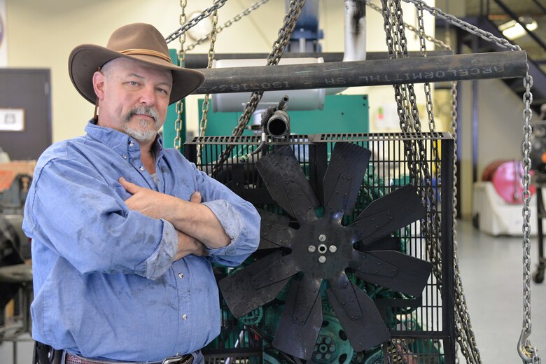 Eric Brewer, 341st Civil Engineer Squadron power support systems mechanic, poses for a photo March 7, 2017, at Malmstrom Air Force Base, Mont. Brewer has currently served a combined 32 years with the Air Force and his continued enthusiasm, commitment and dedication earned him the 2016 Air Force Outstanding Civil Engineer Civilian Manager of the Year award at the major command level. (U.S. Air Force photo/Airman 1st Class Daniel Brosam)