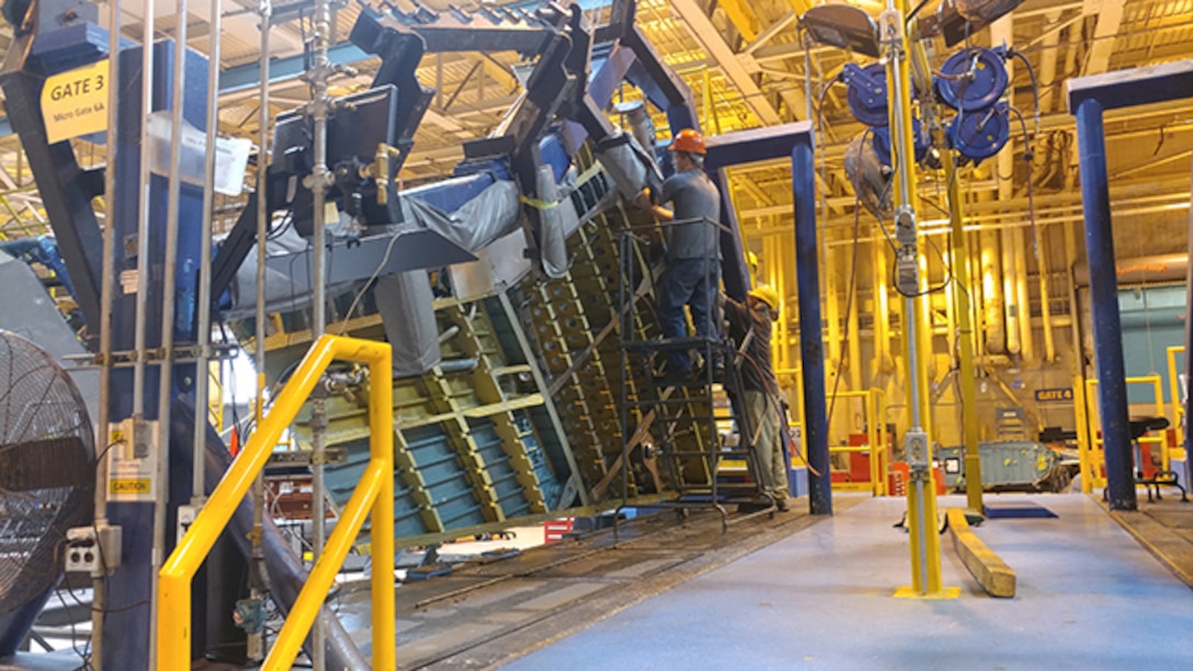 572nd Commodities Aircraft Component Repair Squadron technicians complete intermediate right spar installation at Warner Air Logistics Complex, Robins Air Base, Georgia, on an F-15 Eagle wing Feb. 6, 2017 during a Form, Fit, and Function Test of an organically manufactured spar.