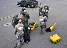 Members of the 16th Airlift Squadron put on chemical, biological, radiological and nuclear (CBRN) gear during Exercise Bonny Jack 2017 on the flightline here, March 8, 2017. Exercise Bonny Jack 2017 is a three-part readiness exercise for the 437th Airlift Wing. The first major event in the exercise was a two-day mobility exercise March 1 and 2, followed by a CBRN exercise. Bonny Jack 2017 will conclude with a large-formation exercise in May.  