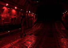 Senior Airman Justin Bell, 16th Airlift Squadron loadmaster, completes preflight checks during Exercise Bonny Jack 2017 on the flightline here, March 8, 2017. Exercise Bonny Jack 2017 is a three-part readiness exercise for the 437th Airlift Wing. The first major event in the exercise was a two-day mobility exercise March 1 and 2, followed by a CBRN exercise. Bonny Jack 2017 will conclude with a large-formation exercise in May.