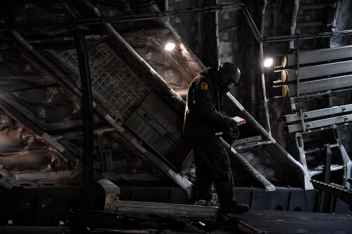 Staff Sgt. Jason Conner, 16th Airlift Squadron loadmaster, inspects a C-17 Globemaster III during preflight checks during Exercise Bonny Jack 2017 on the flightline here, March 8, 2017. Exercise Bonny Jack 2017 is a three-part readiness exercise for the 437th Airlift Wing. The first major event in the exercise was a two-day mobility exercise March 1 and 2, followed by a CBRN exercise. Bonny Jack 2017 will conclude with a large-formation exercise in May.