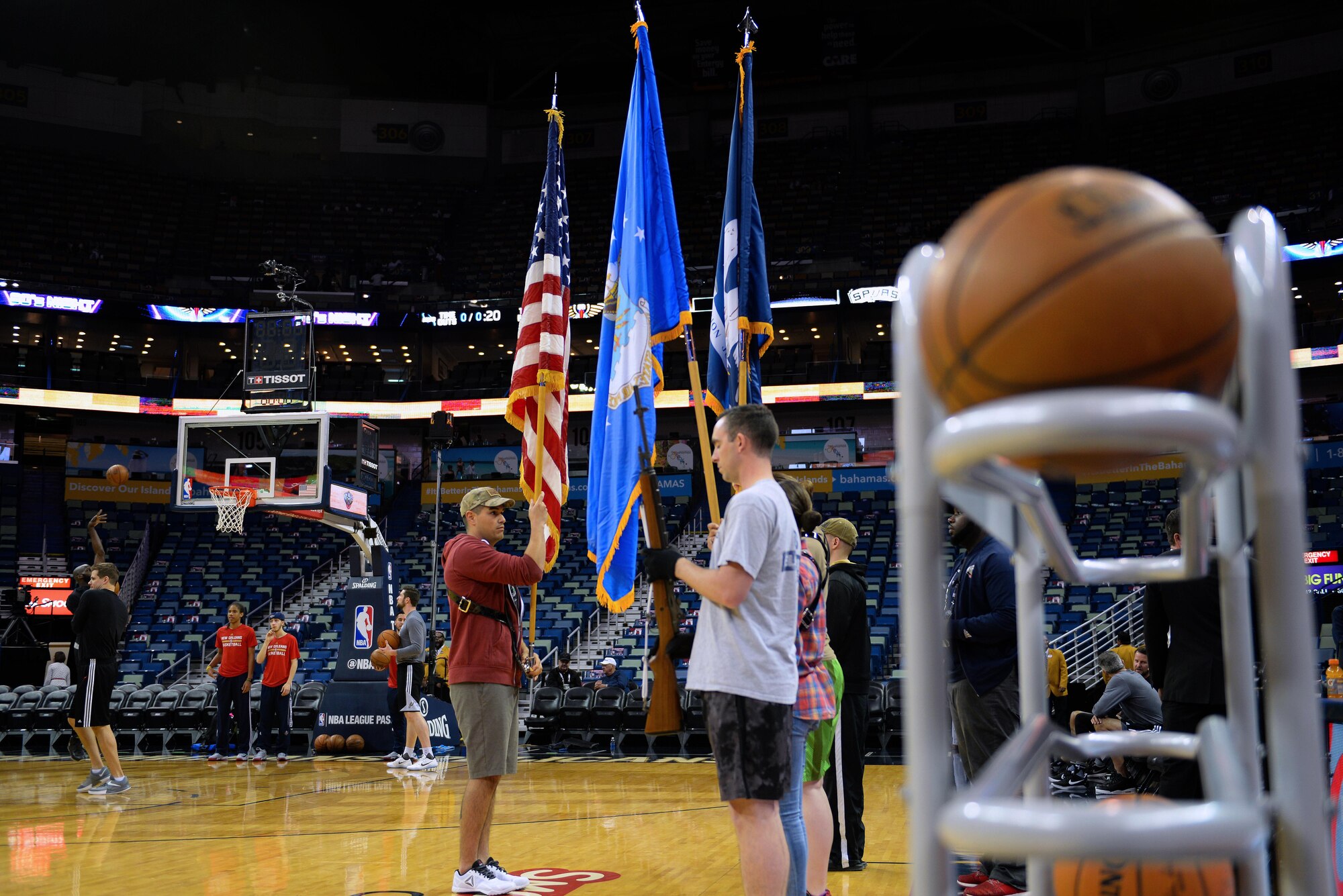Keesler Honor Guard members practice their routine before a New Orleans Pelicans NBA game at the Smoothie King Center, March 3, 2017, in New Orleans. The Keesler Honor Guard posted the colors prior to the game. The Keesler Honor Guard performs hundreds of ceremonial details across Louisiana and Mississippi each year, including funerals, ceremonies, sporting events and parades. (U.S. Air Force photo by Senior Airman Duncan McElroy)
