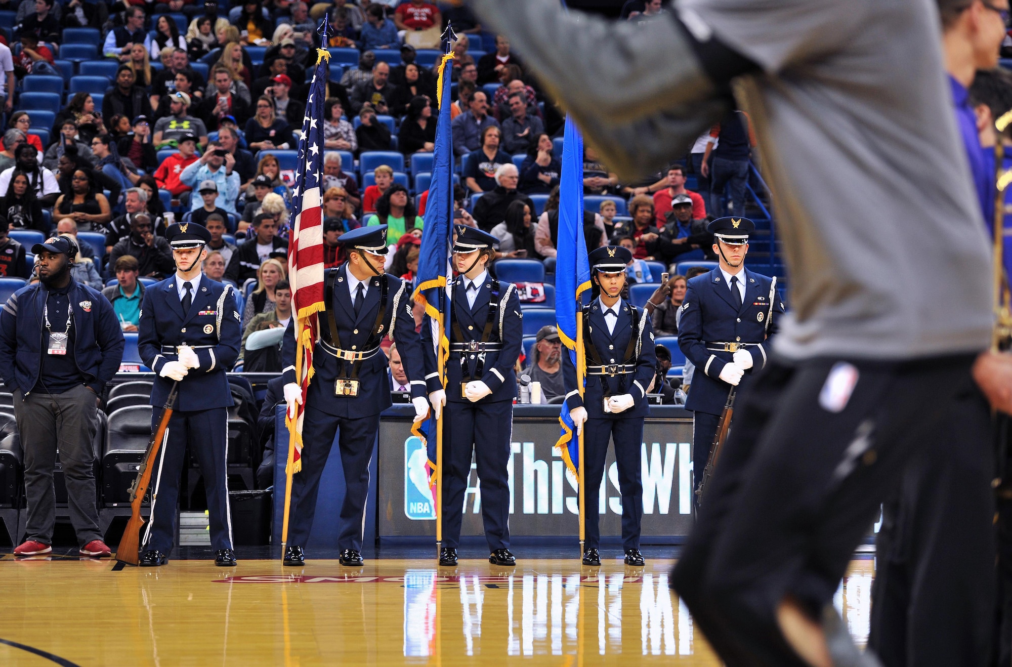 Staff Sgt. Anthony O’Conner-Geiling, Keesler Honor Guard Charlie Flight NCO in charge, does a final check of his Airmen before presenting the colors at a New Orleans Pelicans NBA game at the Smoothie King Center, March 3, 2017, in New Orleans. Each year, the Keesler Honor Guard performs hundreds of ceremonial details across Louisiana and Mississippi, including funerals, ceremonies, sporting events and parades. (U.S. Air Force photo by Senior Airman Duncan McElroy)