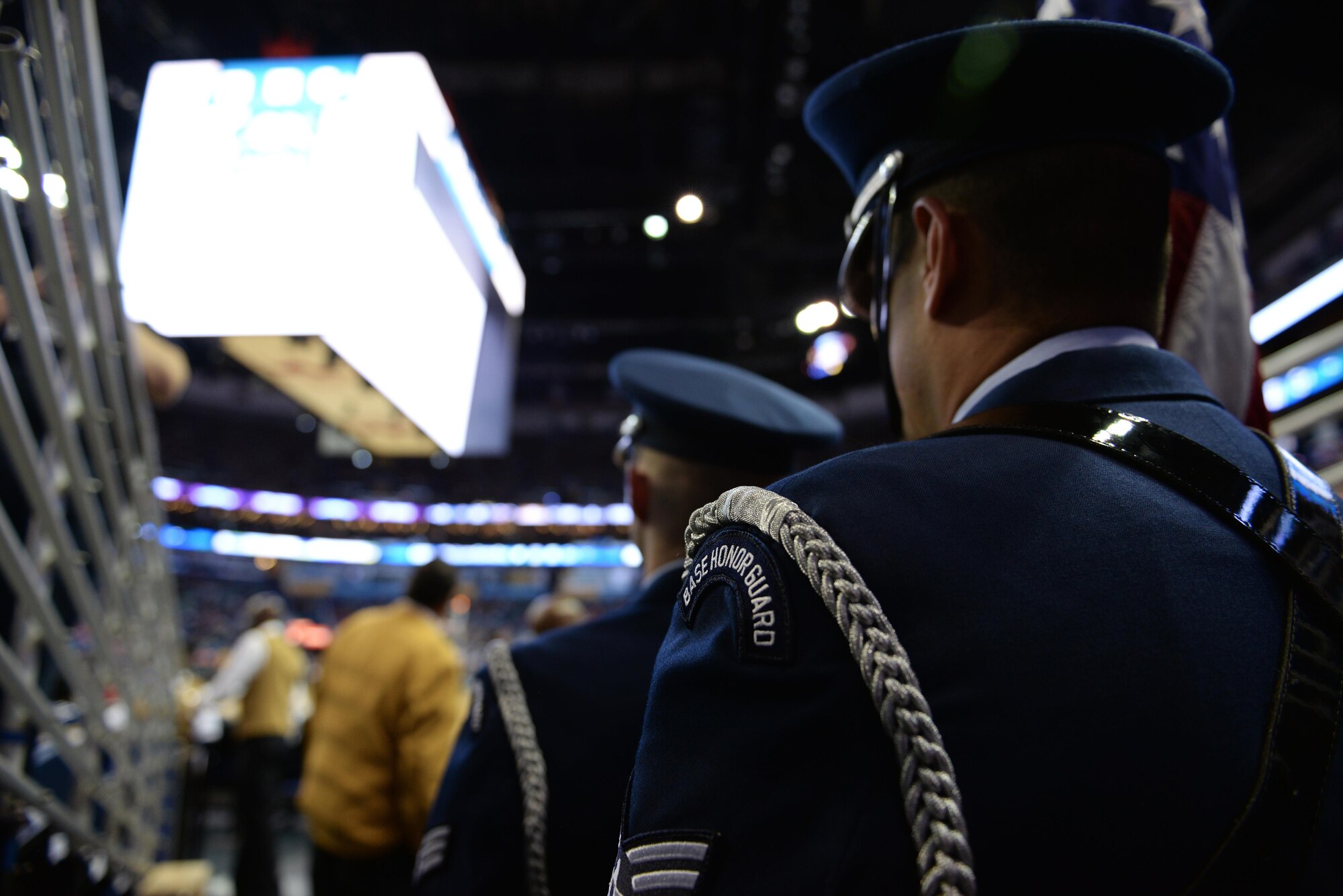 Staff Sgt. Anthony O’Conner-Geiling, Keesler Honor Guard Charlie flight NCO in charge, waits to march onto the court at the New Orleans Pelicans NBA game at the Smoothie King Center, March 3, 2017, in New Orleans, La. The Keesler Honor Guard posted the colors prior to the game and performs hundreds of ceremonial details across Louisiana and Mississippi each year, including funerals, ceremonies, sporting events and parades. (U.S. Air Force photo by Senior Airman Duncan McElroy)