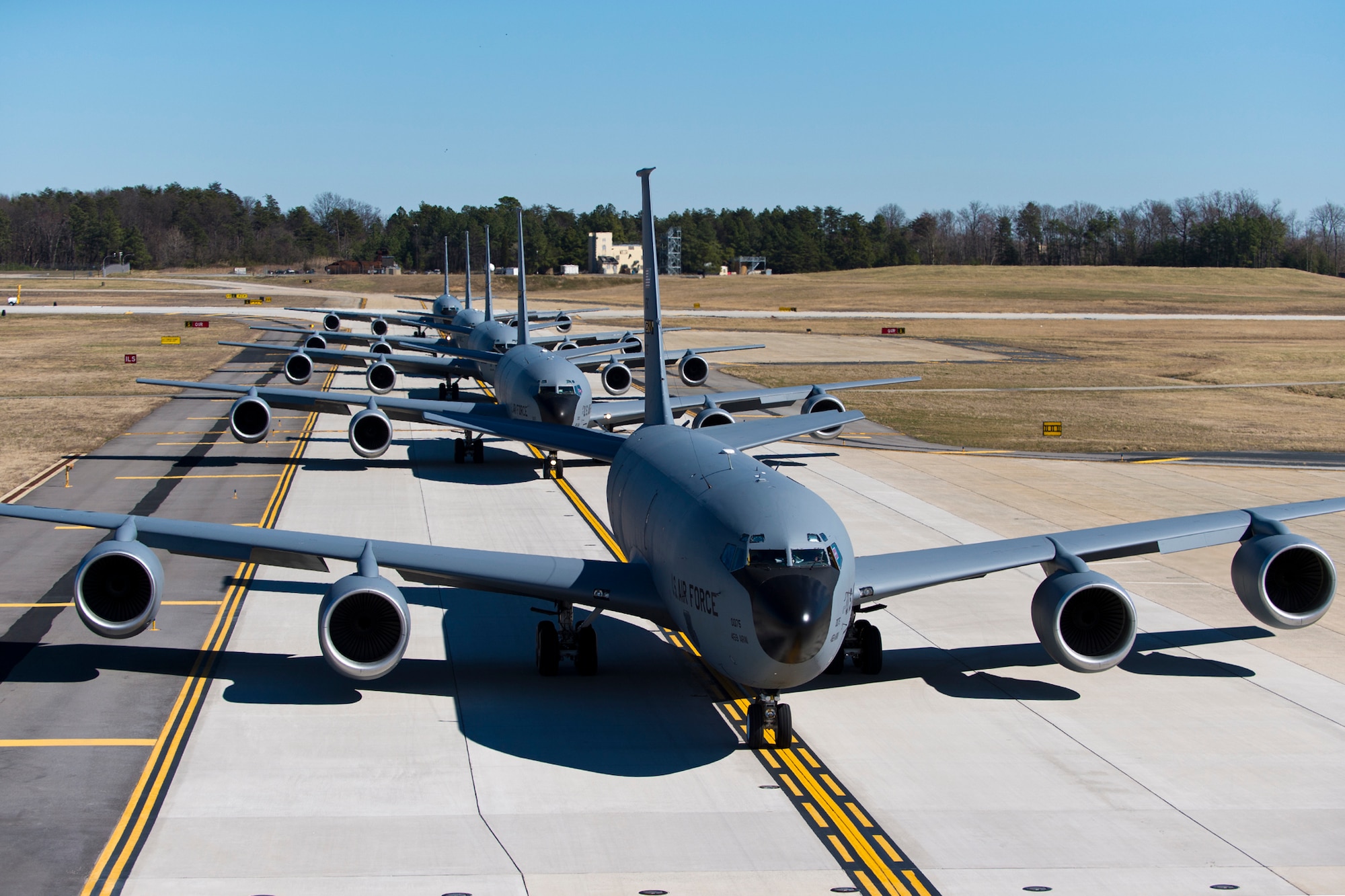 Five 459th Air Refueling Wing KC-135R Stratotankers conduct an elephant walk during an alert exercise at Joint Base Andrews, Maryland, March 5, 2017. The term “elephant walk” has been used since World War II when large numbers of aircraft would line up for rapid response take-off. Onlookers said the procession looked like elephants headed to a watering hole, and name has been part of the U.S. Air Force lexicon ever since. (U.S. Air Force photo/Tech. Sgt. Kat Justen)