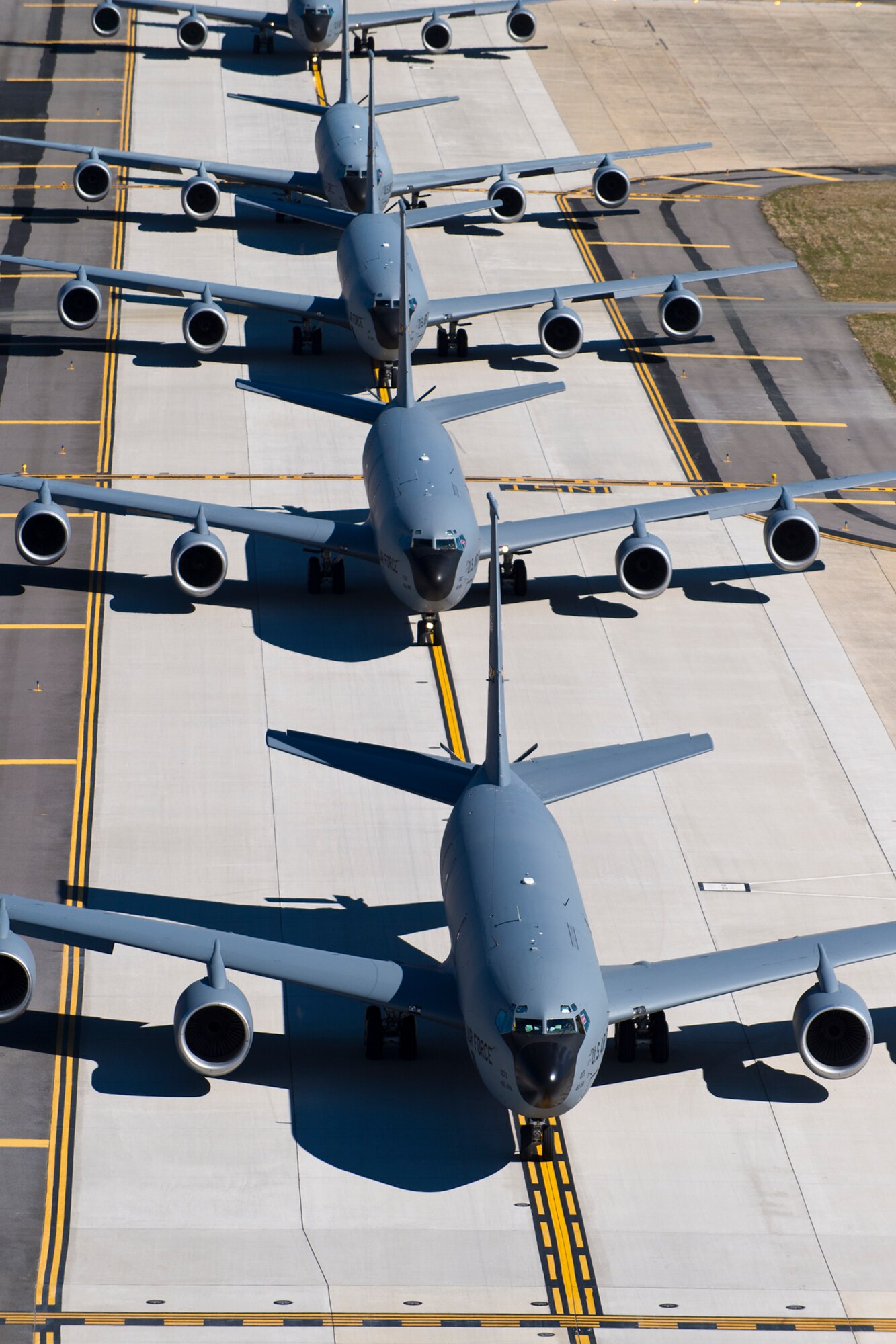 Five 459th Air Refueling Wing KC-135R Stratotankers conduct an elephant walk during an alert exercise at Joint Base Andrews, Maryland, March 5, 2017. The term “elephant walk” has been used since World War II when large numbers of aircraft would line up for rapid response take-off. Onlookers said the procession looked like elephants headed to a watering hole, and name has been part of the U.S. Air Force lexicon ever since. (U.S. Air Force photo/Tech. Sgt. Kat Justen)