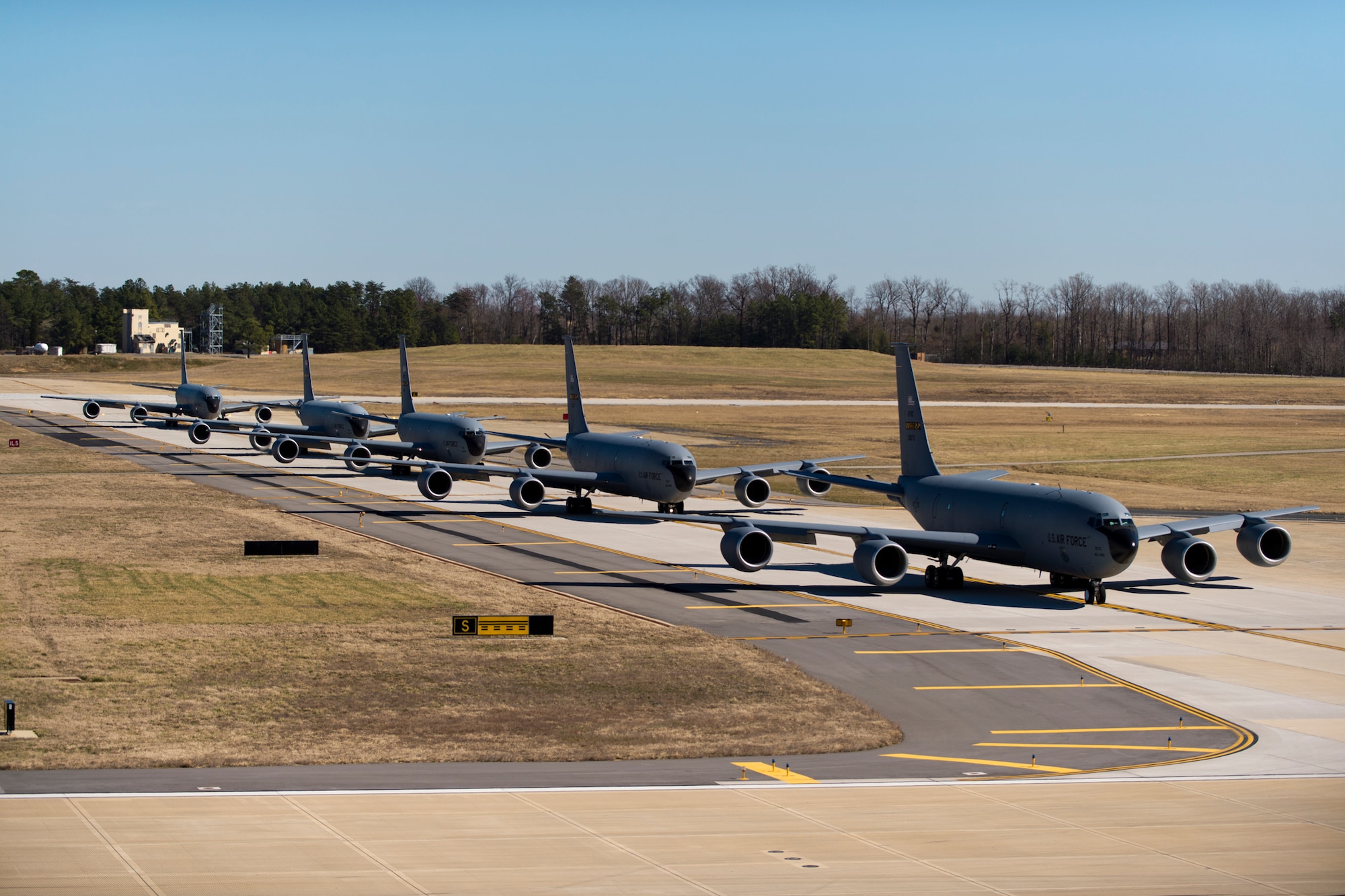 Five 459th Air Refueling Wing KC-135R Stratotankers conduct an elephant walk during an alert exercise at Joint Base Andrews, Maryland, March 5, 2017. The term “elephant walk” has been used since World War II when large numbers of aircraft would line up for rapid response take-off. Onlookers said the procession looked like elephants headed to a watering hole, and name has been part of the U.S. Air Force lexicon ever since. (U.S. Air Force photo/Tech. Sgt. Kat Justen)