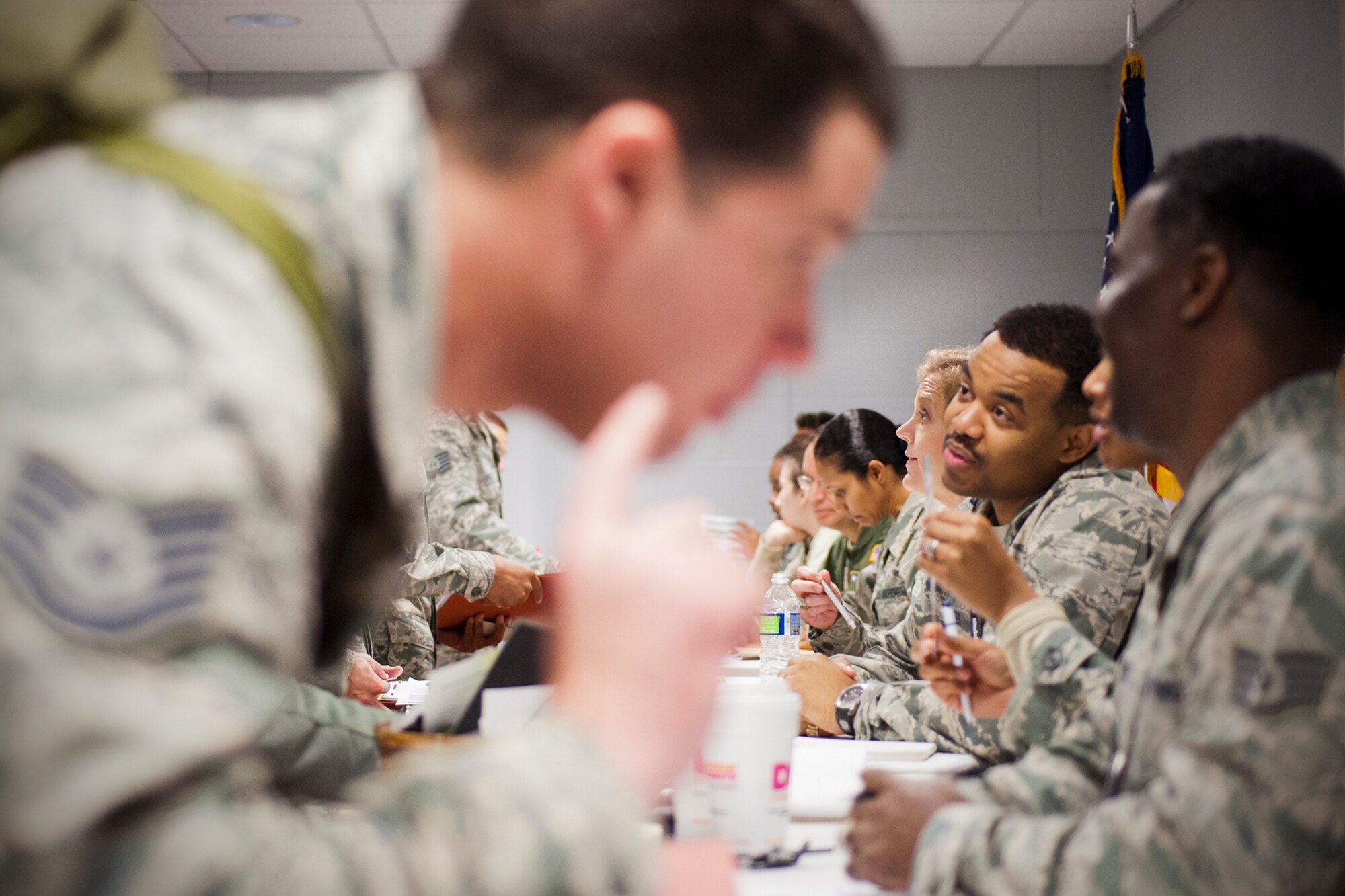 Members of the 459th Air Refueling Wing cycle through a simulated deployment line as part of an exercise at Joint Base Andrews, Maryland, March 5, 2017. Deployers prepared their mobility paperwork and bags prior to visiting Eligibility, Finance, Airman and Family Readiness, Chaplaincy, Legal, Medical and Passenger Manifest stations. (U.S. Air Force photo/Tech. Sgt. Kat Justen)