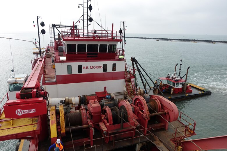 The hydraulic cutter-head suction dredge H.R. Morris digs up sediment from the Channel Islands Harbor sand trap Feb. 14. Seattle-based Manson Construction, the Corps' contractor for the project, piped the material to nearby Hueneme Beach to replenish sand lost to erosion.