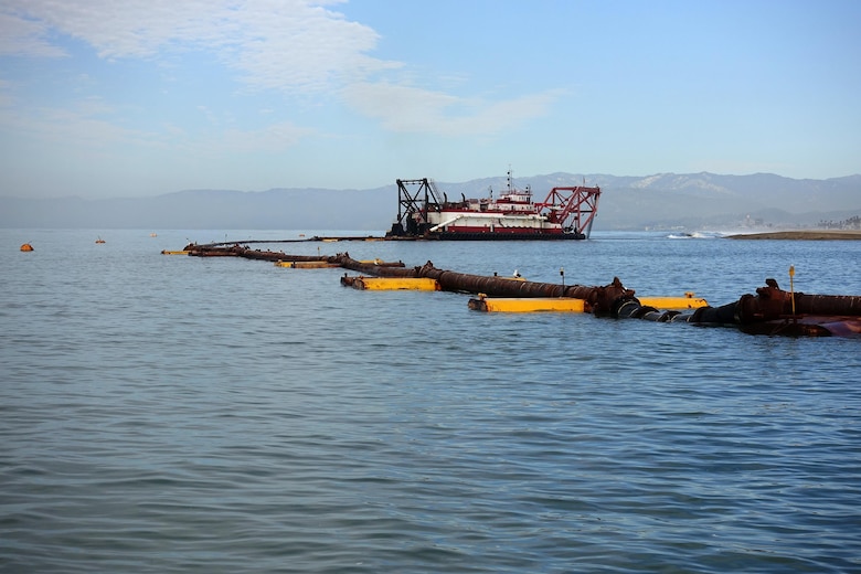 The hydraulic cutter-head suction dredge H.R. Morris digs up sediment from the Channel Islands Harbor sand trap Feb. 14. Seattle-based Manson Construction, the Corps' contractor for the project, piped the material to nearby Hueneme Beach to replenish sand lost to erosion.