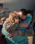 U.S. Air Force Airman 1st Class Krystian Zyszczynski, an aircraft hydraulic systems specialist with the 182nd Maintenance Squadron, Illinois Air National Guard, reunites with family after returning home from deployment in Peoria, Ill., March 7, 2017. Zyszczynski and more than 100 Airmen with the 182nd Airlift Wing mobilized to an undisclosed location in Southwest Asia in support of Operation Freedom’s Sentinel. (U.S. Air National Guard photo by Tech. Sgt. Lealan Buehrer)