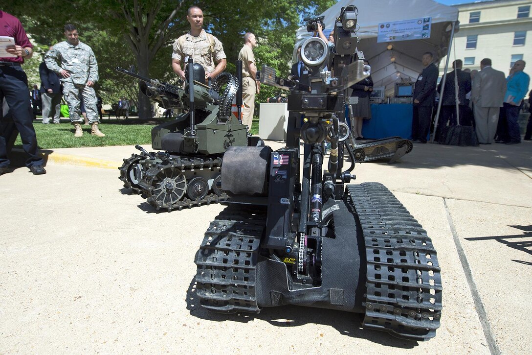 The Defense Department announced March 9, 2017, awards to 160 university researchers at 84 institutions totaling $47 million through the Defense University Research Instrumentation Program. Pictured here, Marine Corps Gunnery Sgt. Joseph Perara guides a robot during the Department of Defense Lab Day at the Pentagon, May 14, 2015. Perara is assigned to the Marine Warfighting Laboratory. DoD photo by EJ Hersom