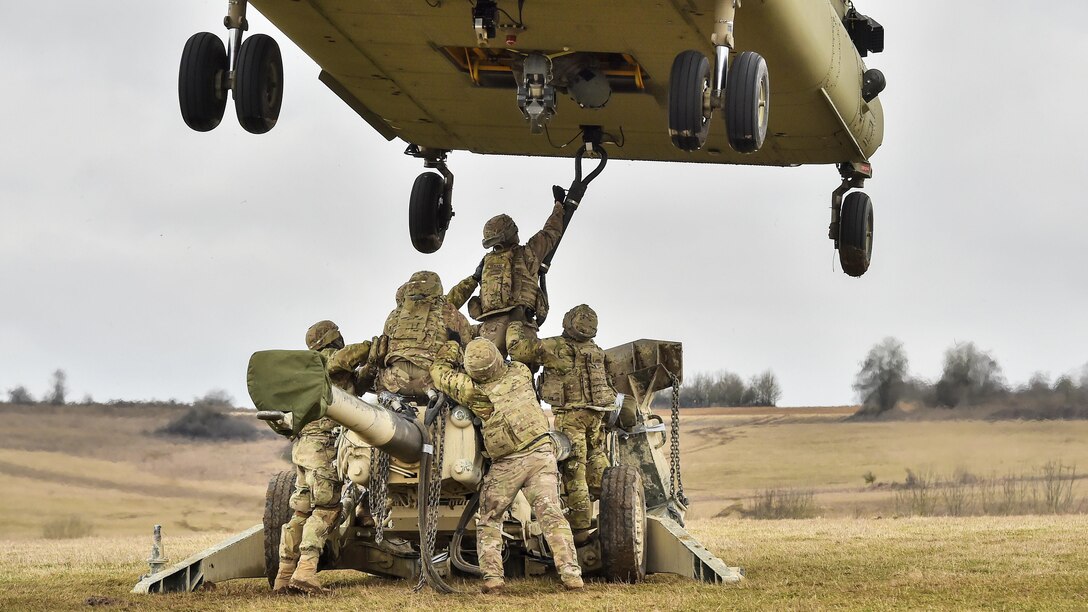 Soldiers conduct slingload operations during Dynamic Front II at the 7th Army Training Command's Grafenwoehr Training Area, Germany, March 9, 2017. The soldiers, assigned to Field Artillery Squadron, 2nd Cavalry Regiment, received support from the 12th Combat Aviation Brigade. The artillery exercise includes nearly 1,400 participants from nine NATO nations and focuses on developing solutions by testing interoperability at the tactical level. Army photo by Gertrud Zach
