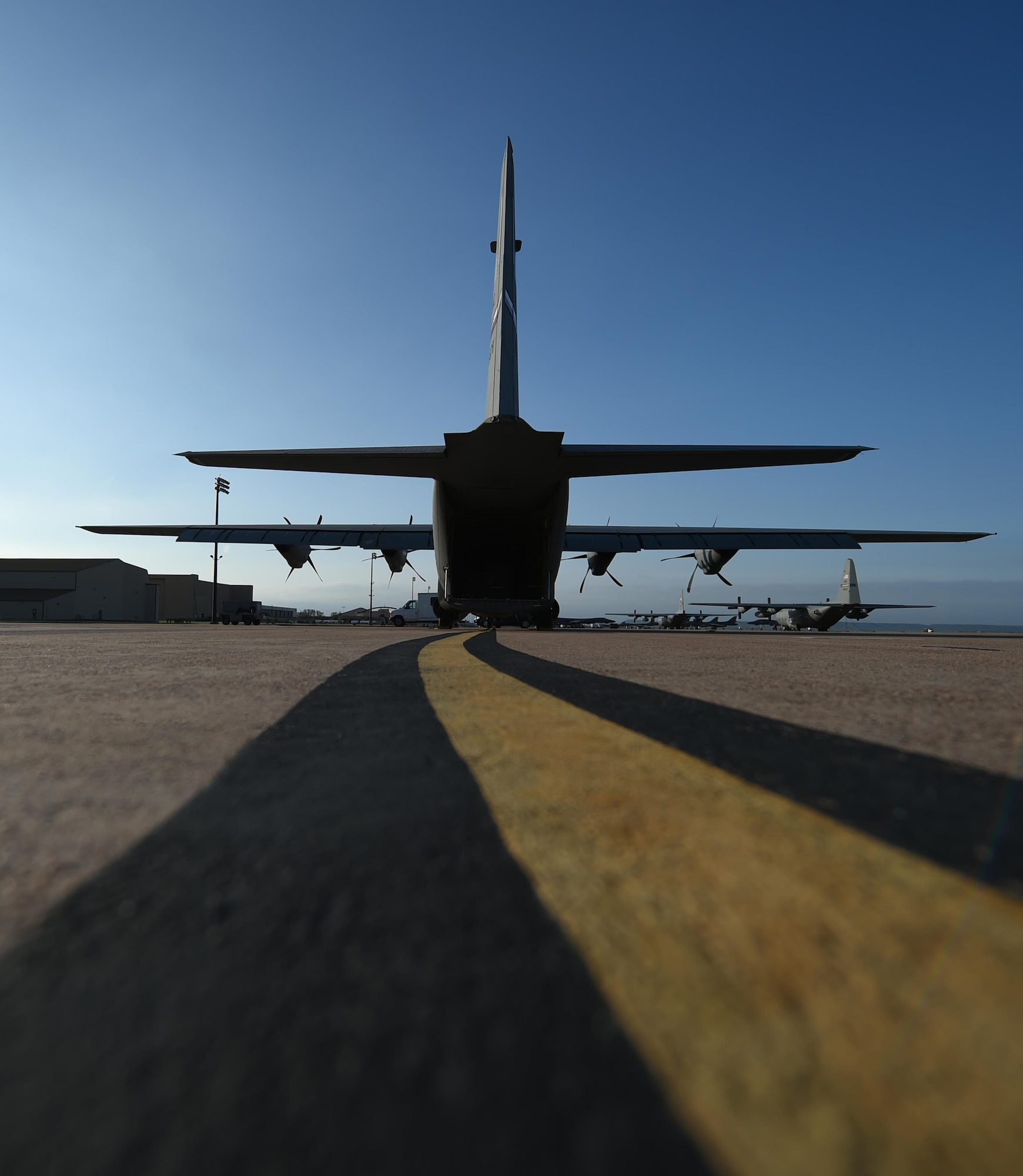 A U.S. Air Force C-130J Super Hercules waits for the start of the 317th Airlift Group Rodeo competition on the flight line March 8, 2017, at Dyess Air Force Base, Texas. The Rodeo is a tactical airlift competition between the 39th Airlift Squadron, 40th AS and 317th Operations Support Squadron, whose goal is to demonstrate capabilities, improve procedures, and enhance standardization for global operations. (U.S. Air Force photo by Airman 1st Class Emily Copeland)
