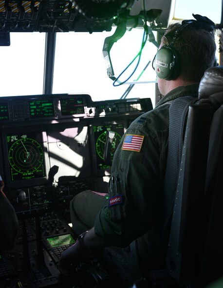 U.S. Air Force Capt. Matt Gabso, 39th Airlift Squadron pilot, performs verbal checklist after takeoff March 8, 2017, at Dyess Air Force Base, Texas. The 317th Airlift Group held a tactical airlift competition between the 39th AS, 40th AS and 317th Operations Support Squadron, the goal of which is to have participants demonstrate their capabilities, improve procedures, and enhance standardization for global operations. (U.S. Air Force photo by Airman 1st Class Emily Copeland)