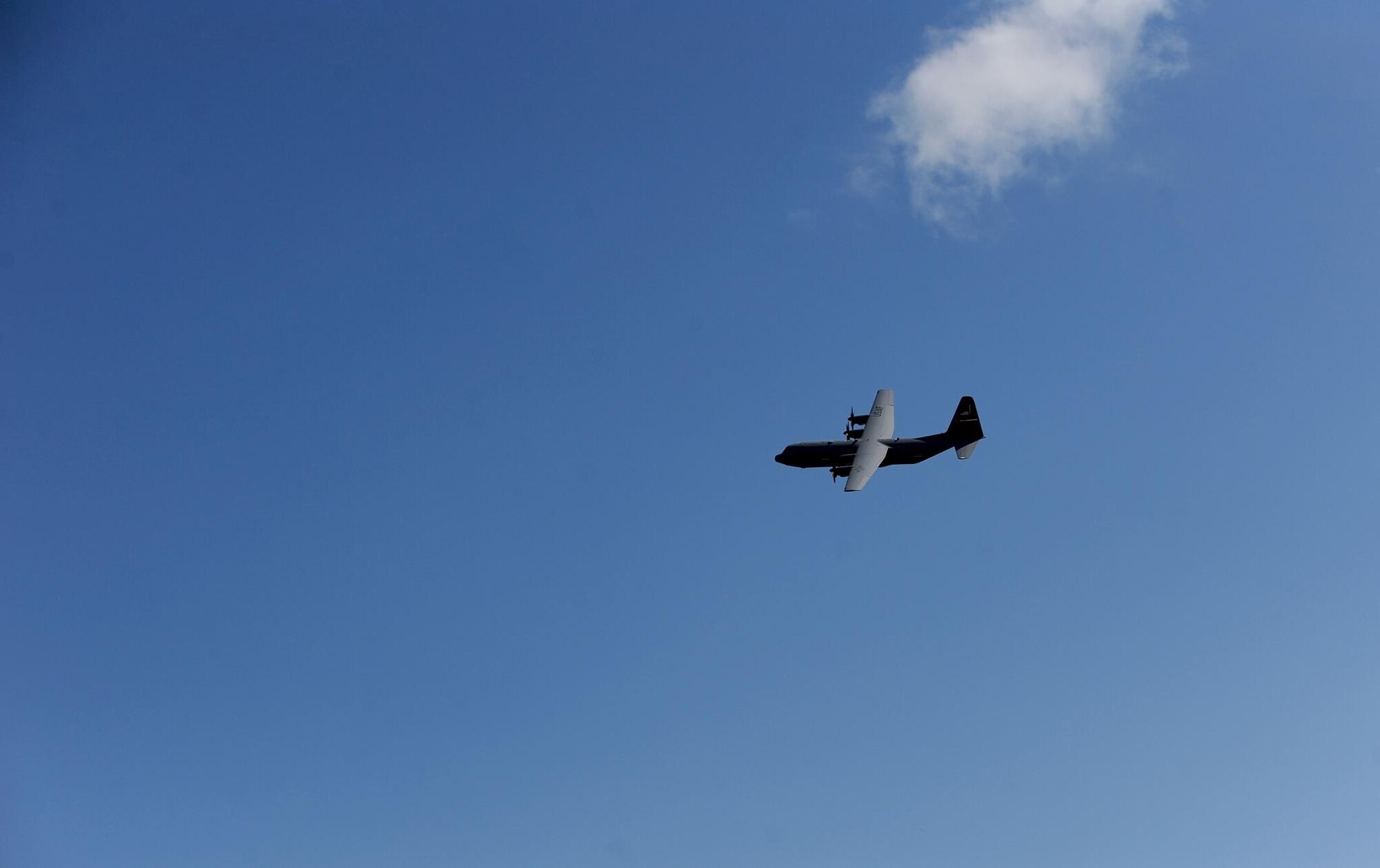 A U.S. Air Force C-130J Super Hercules performs a tactical maneuver during the assault landing event at Dyess Air Force Base, Texas, March 8, 2017. The assault landing was the final portion of the tactical airlift competition held by the 317th Airlift Group where several squadrons competed for the most points. (U.S. Air Force photo by Airman 1st Class April Lancto)