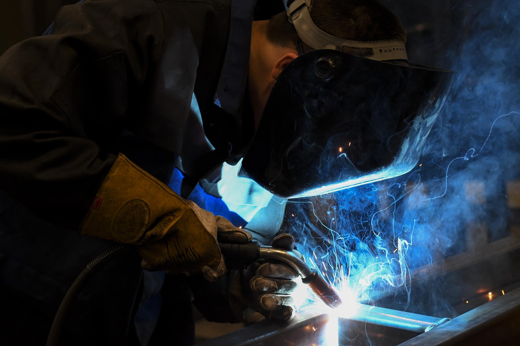 U.S. Air Force Senior Airman Kelly Huddleston, 51st Maintenance Squadron aircraft metals technology journeyman, welds together an A-frame at Osan Air Base, Republic of Korea, March 7, 2017. The Airmen in the aircraft metals technology shop are able to fabricate any metal item needed for mission accomplishment, ranging from small, specifically dimensioned screws to large panels cut by a precision computer. (U.S. Air Force photo by Staff Sgt. Victor J. Caputo)