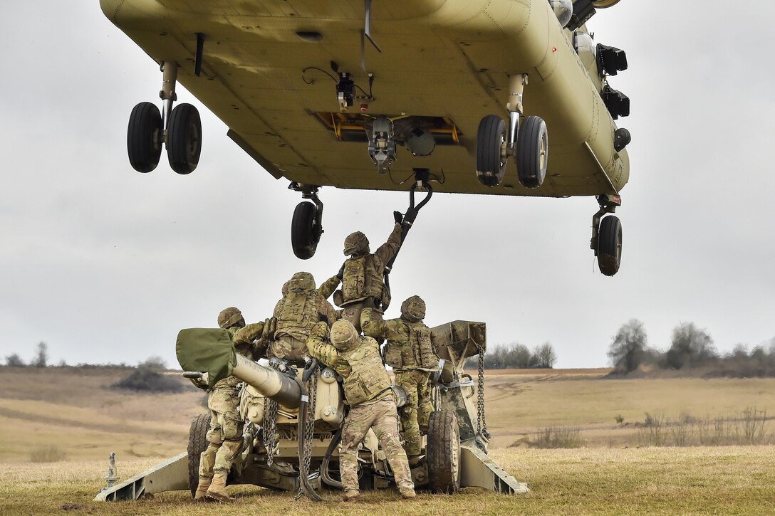 Soldiers conduct slingload operations during Dynamic Front II at the 7th Army Training Command's Grafenwoehr Training Area, Germany, March 9, 2017. The soldiers, assigned to Field Artillery Squadron, 2nd Cavalry Regiment, received support from the 12th Combat Aviation Brigade. The artillery exercise includes nearly 1,400 participants from nine NATO nations and focuses on developing solutions by testing interoperability at the tactical level. Army photo by Gertrud Zach
