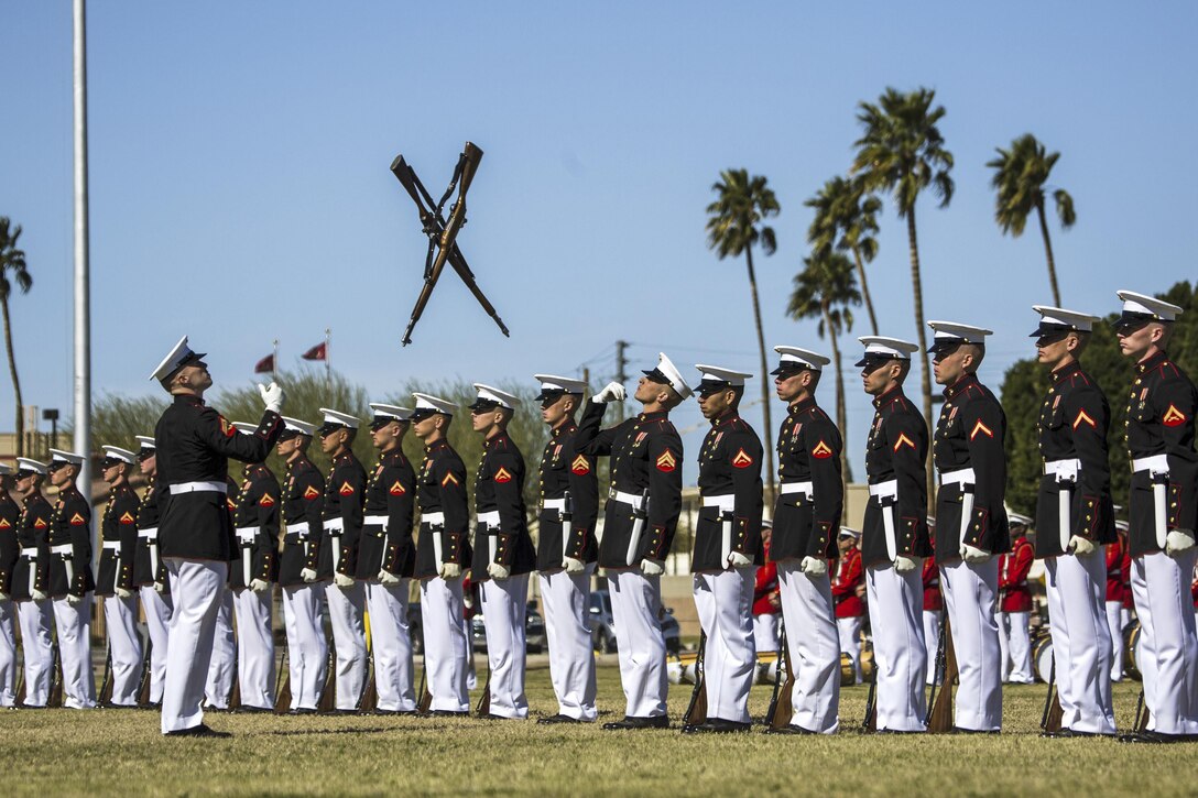 The Marine Corps Silent Drill Platoon performs during the Battle Color Ceremony at Marine Corps Air Station Yuma, Ariz., March 2, 2017. The event celebrated Marine Corps history using music, marching and precision drill. Marine Corps photo by Lance Cpl. Christian Oliver Cach