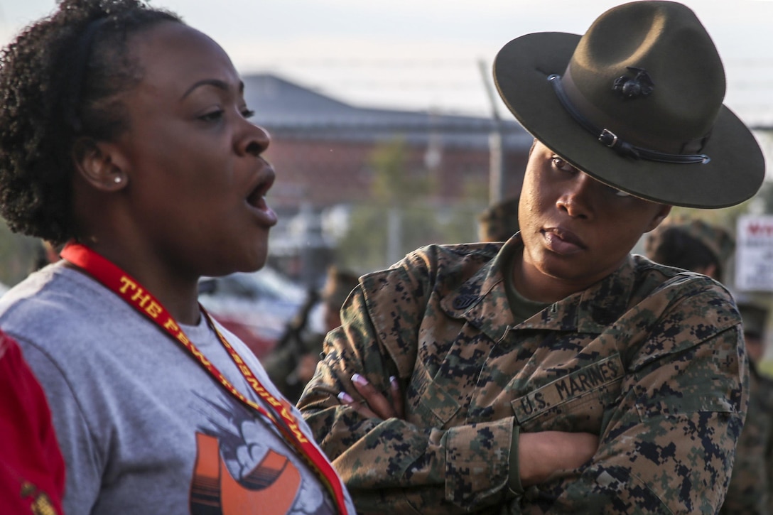 Marine Corps Staff Sgt. Simone King instructs Kristin Tolman, a school resource officer with Recruiting Station Columbia, during a workshop at Marine Corps Recruit Depot Parris Island, S.C., March 8, 2017. The workshop provided an opportunity for educators from recruiting stations to observe Marine Corps training to better inform the students in their local areas. King is a senior drill Instructor assigned to 4th Battalion, Recruit Training Regiment. Marine Corps photo by Lance Cpl. Jack A. E. Rigsby