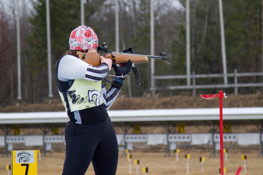 Missouri Army National Guard Sgt. Ashley Anderson fires her weapon during a biathlon at Camp Ethan Allen Training Site in Jericho, Vt., March 7, 2017. Vermont Army National Guard photo by Spc. Avery Cunningham