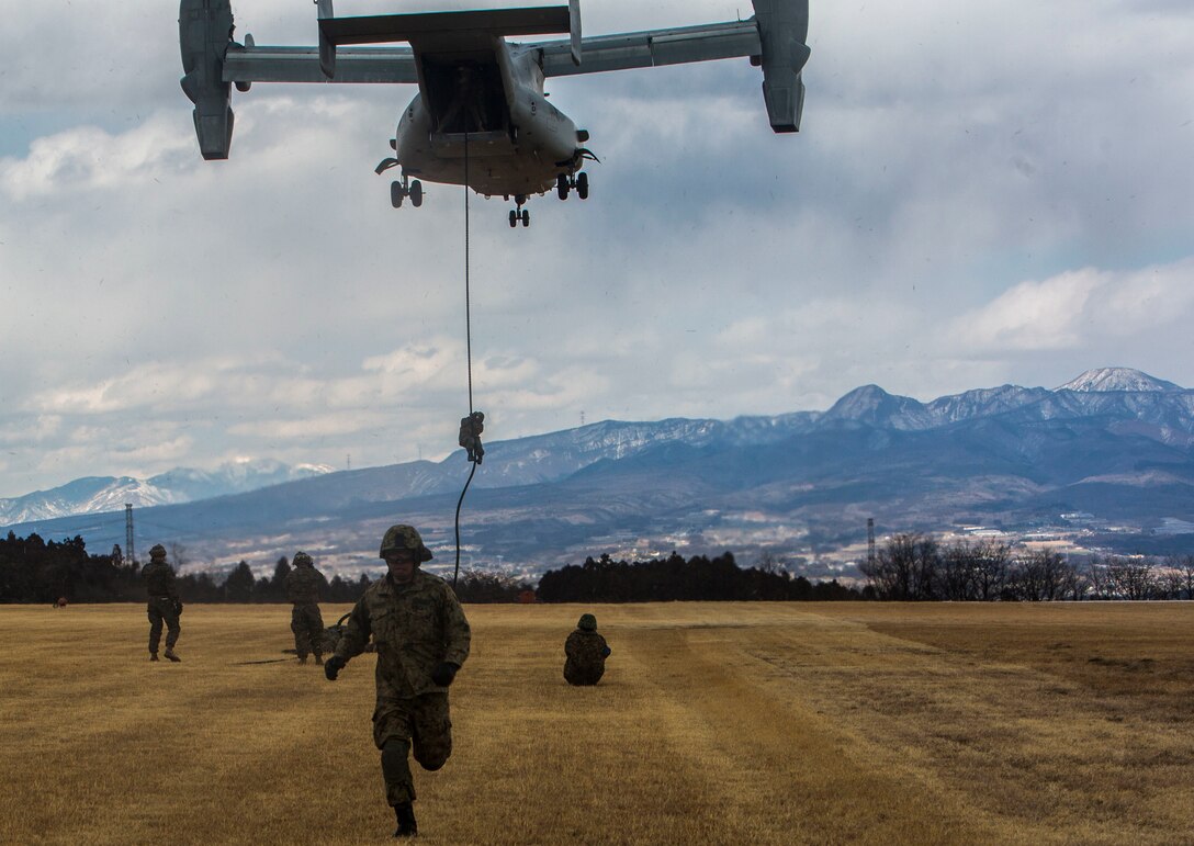 Members of the Japanese Ground Self-Defense Force, 30th Infantry Regiment, 12th Brigade, Eastern Army fast rope out of an MV-22B Osprey tiltrotor aircraft  during Forest Light 17-1 at Camp Soumagahara on Mar. 9, 2017. Forest Light is a routine, semi-annual exercise conducted by U.S. and Japanese forces in order to strengthen interoperability and combined capabilities in defense of the U.S.-Japanese alliance. (U.S. Marine Corps photo by Cpl. Kelsey Dornfeld)