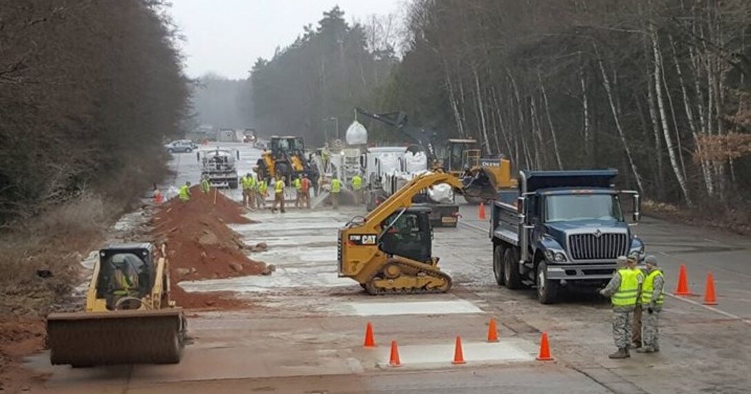 Airmen assigned to the 435th Construction and Training Squadron participate in training for the new Rapid Airfield Damage Repair technique on Ramstein Air Base, Germany, Feb. 20, 2017. The RADR technique makes it possible for teams to repair 120 craters in six-and-a-half hours with 3,000 aircraft passes, which provides a ten-time increase in crater amount and 300-time increase in passes allowed over the current method. (Courtesy photo by Tech. Sgt. Robert Webb)