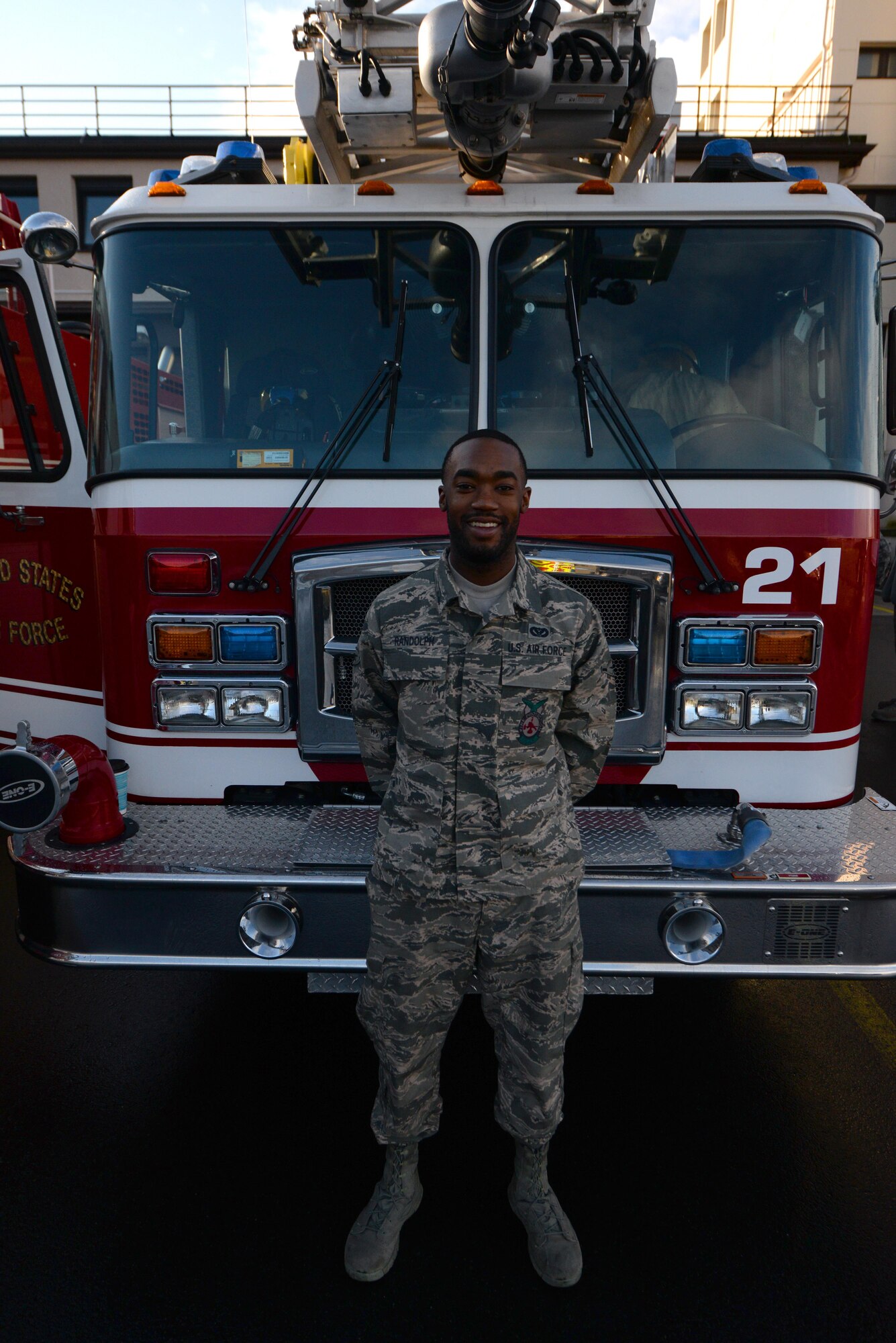Airman Gregg Randolph, 86th Civil Engineer Squadron firefighter, poses for a photo outside Fire Station one on Ramstein Air Base, Germany, Mar. 7, 2017. A certified first responder, Randolph understood the sense of urgency required in an emergency situation he encountered on his way home one night. (U.S. Air Force photo by Airman 1st Class D. Blake Browning)