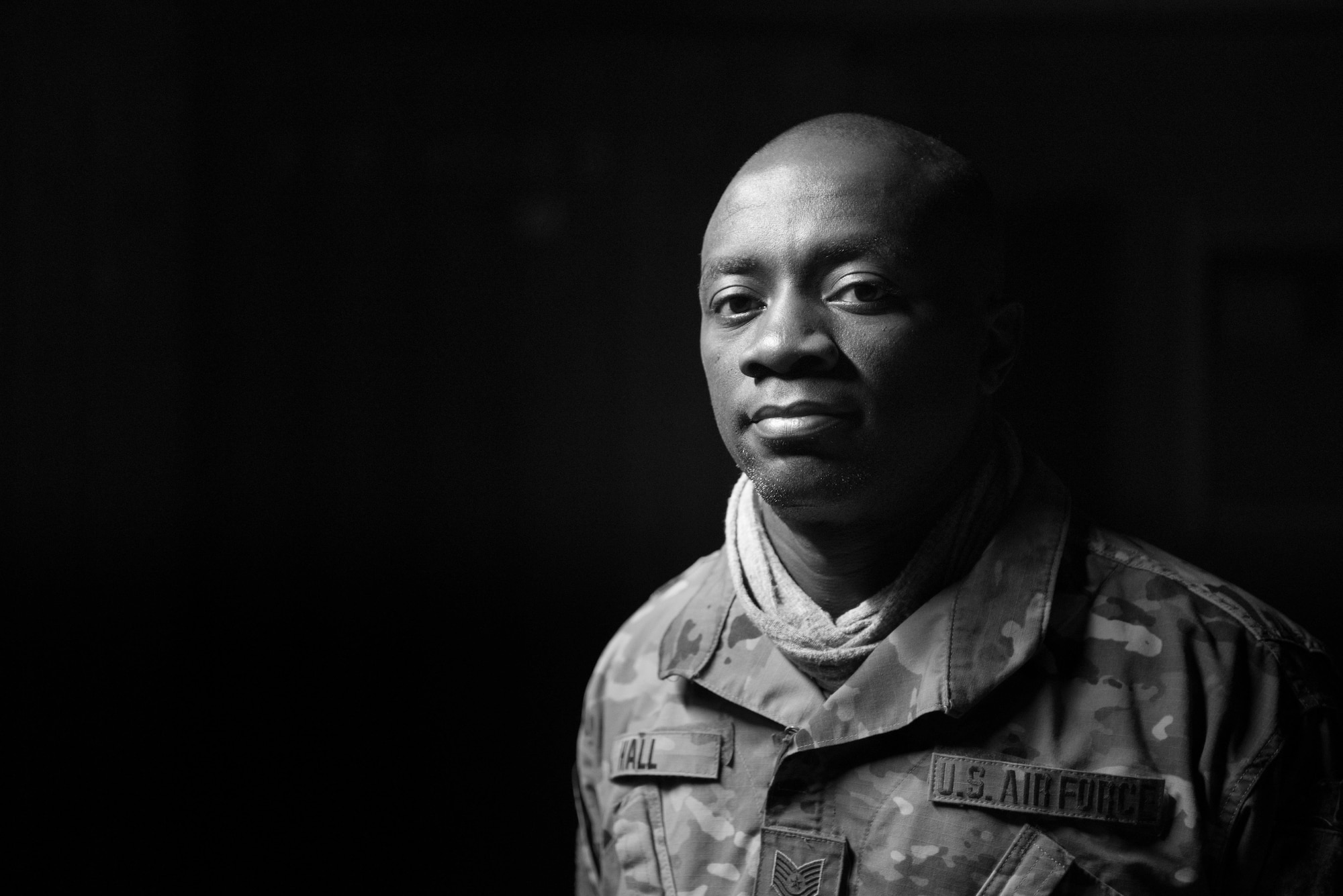 Tech. Sgt. Laughten Hall, 407th Expeditionary Security Forces Squadron, poses for a photo Feb. 13, 2017, at Al Asad Air Base, Iraq. Hall immigrated to the U.S. from Jamaica with his father. (U.S. Air Force photo/Master Sgt. Benjamin Wilson)(Released)
