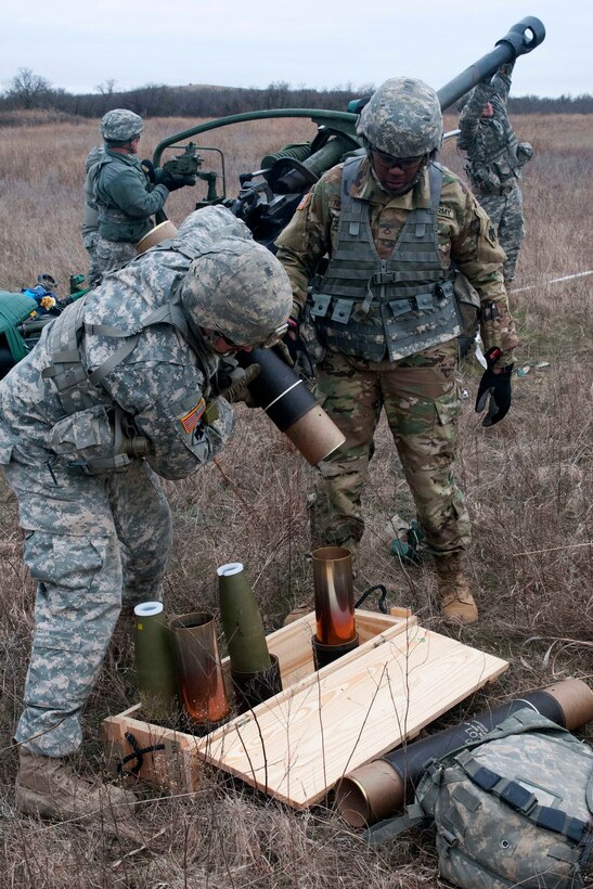 Oklahoma Army National Guardsmen prepare howitzer ammunition during live-fire training at Fort Sill, Okla., March 4, 2017. Oklahoma Army National Guard photo by Sgt. Bradley Cooney