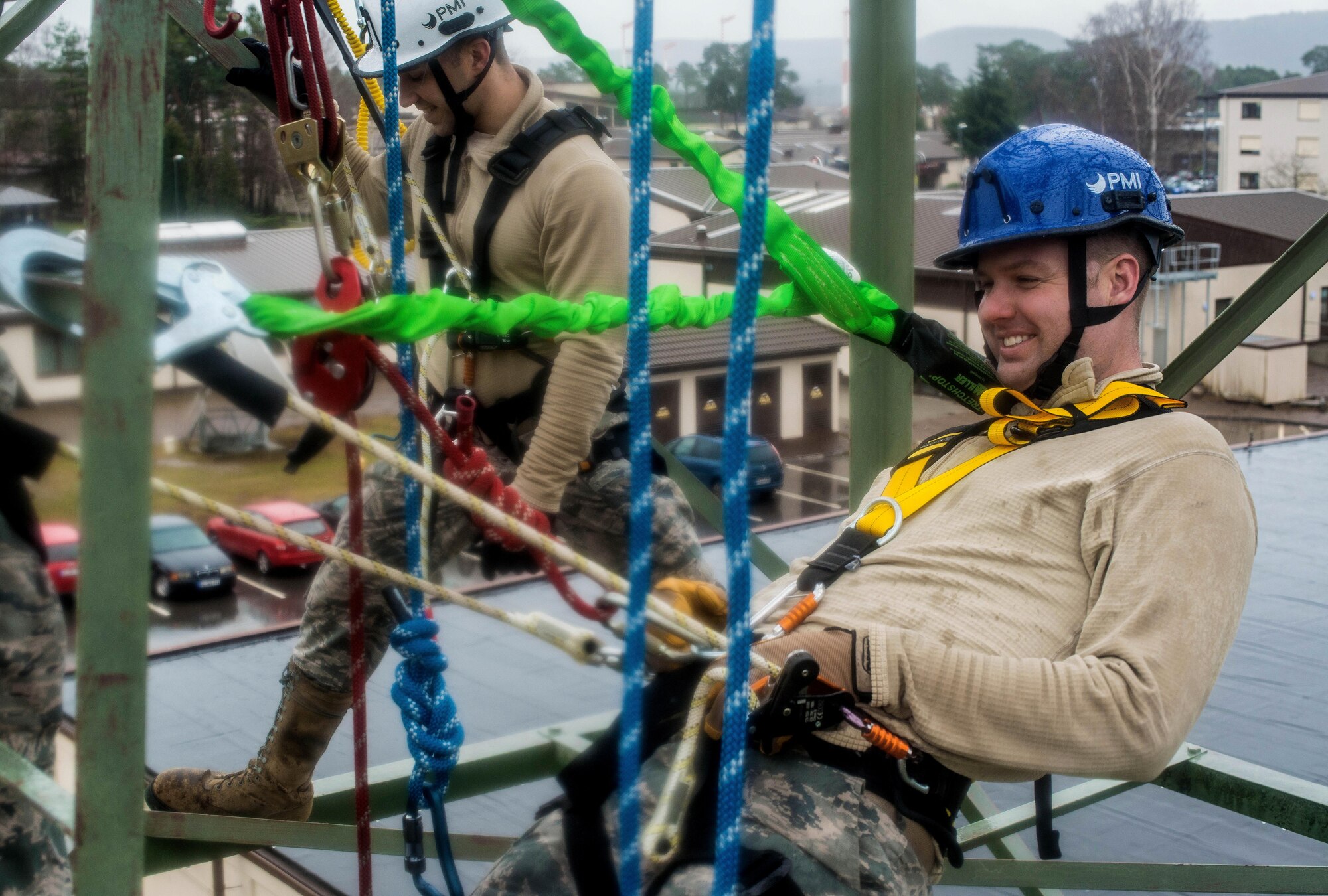 Staff Sgt. Ryan Unger, 1st Communications Maintenance Squadron cable and antenna systems team lead, leans back on his positioning lanyard during tower rescue and climbing training on Ramstein Air Base, Germany, March 9, 2017. The training is required yearly to remain certified in climbing. (U.S Air Force photo by Senior Airman Tryphena Mayhugh)