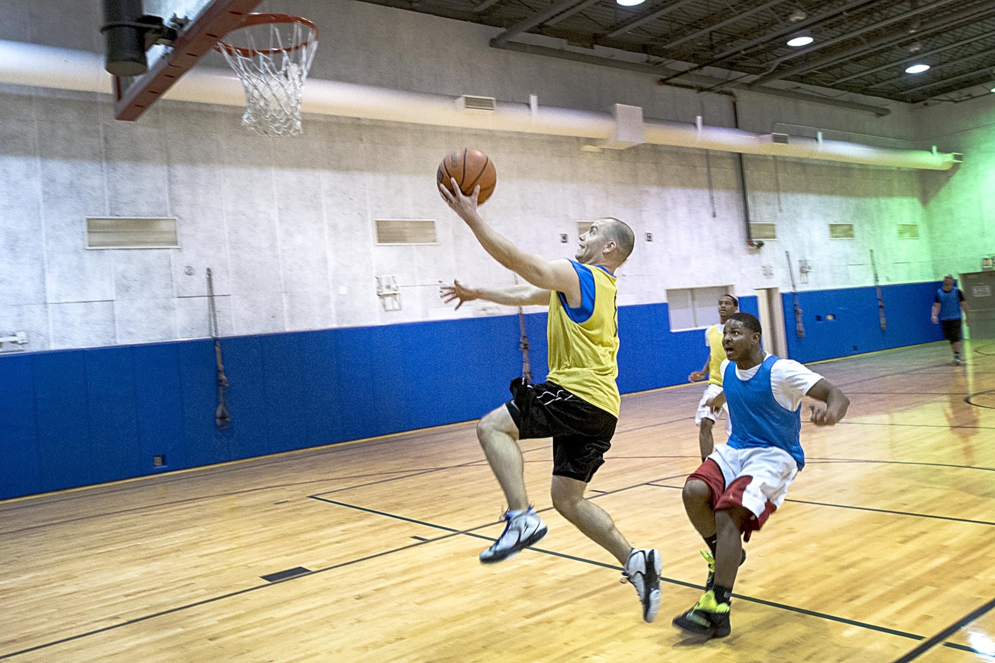 Antonio Cruz, 434th Security Forces Squadron player goes in for an uncontested layup March 4, 2016 at Grissom Air Reserve Base, Ind. Cruz and his SFS Defender teammates held off an outmanned 434th Maintenance Squadron team 50-47 to win the base’s annual basketball tournament. (U.S. Air Force photo/Senior Airman Cali Wetli)