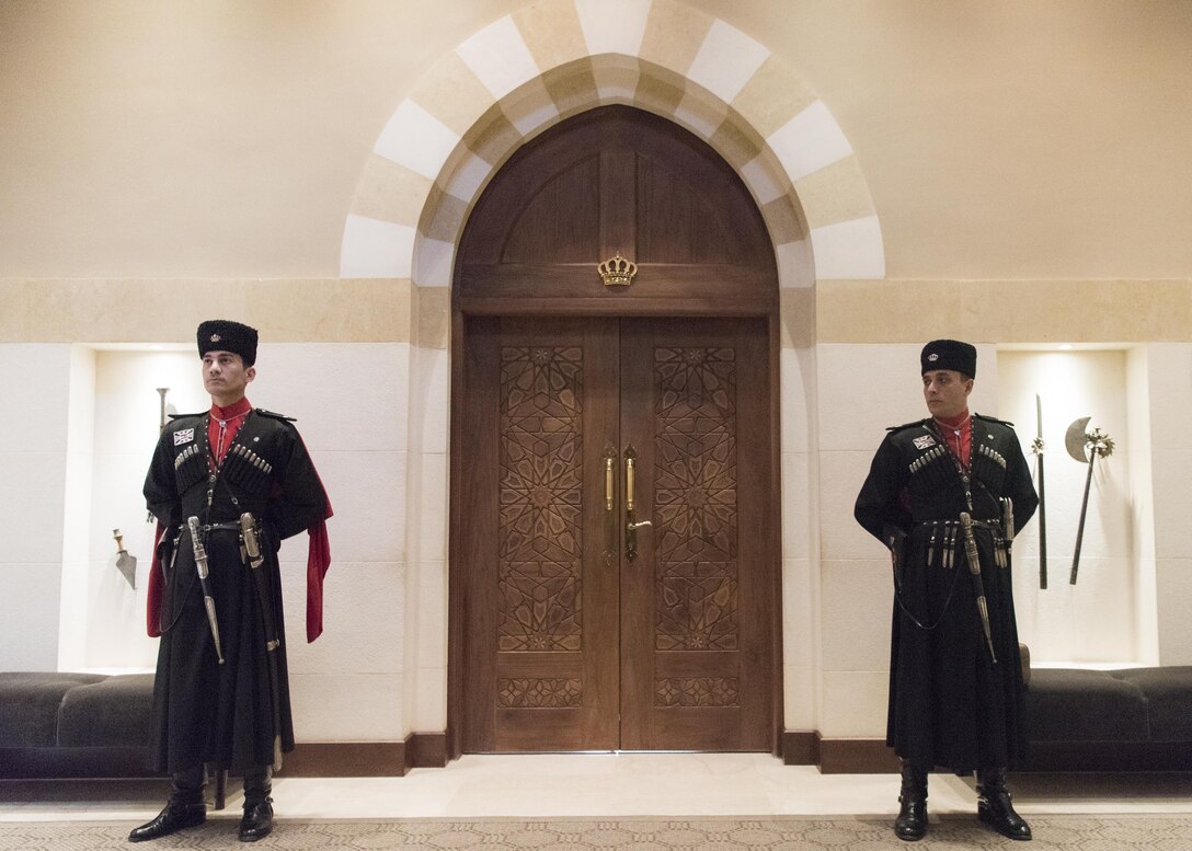 Royal guards stand watch over a meeting between Marine Corps Gen. Joe Dunford, chairman of the Joint Chiefs of Staff, and Jordan’s King Abdullah II at his palace in Amman, Jordan, March 9, 2017. DoD photo by Navy Petty Officer 2nd Class Dominique A. Pineiro 