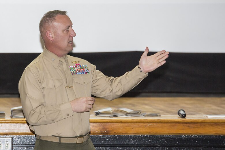 Col. Peter Buck speaks at the Career Development Information Forum at the Lasseter Theater aboard Marine Corps Air Station Beaufort, March 6. The forum was held to educate Civilian Marines about the programs available to them to ensure they are fully trained to expand their careers and complete their mission. Buck invited them to engage, participate and take advantage of the forum. Buck is the commanding officer of MCAS Beaufort.