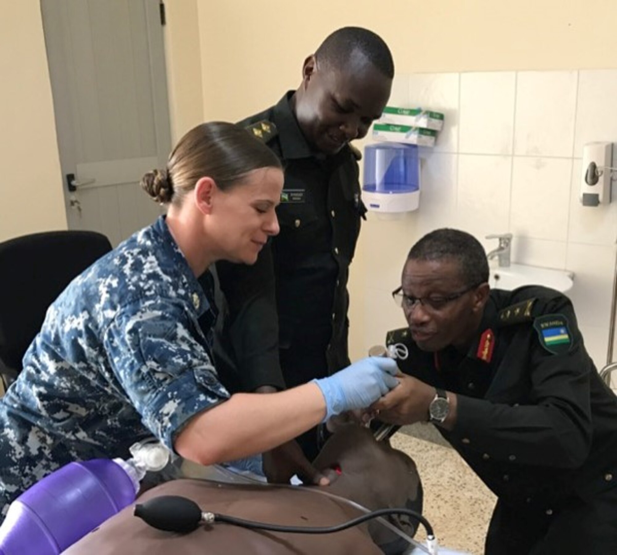 The Defense Institute of Medical Operations partnered with the Rwandan Defense Force last month for to complete phase three of a project to create Rwanda's first High Fidelity Medical Modeling and Simulation Center, located at the Rwandan Military Hospital. The medical simulation center will help equip military personnel with necessary skills to save the lives of peacekeepers injured while on U.N. missions, and will also serve as a tool to strengthen the general health system in the Rwanda. Over three weeks, the DIMO team certified 28 RDF personnel in International Trauma Life Support, and conducted “train the trainer” courses, so that six RDF personnel are now qualified as potential instructors. Subsequent training will include in-hospital care, and hopefully achieving status as an ITLS training center, allowing the RDF to fully train and certify others to use their newly acquired capability and capacity.