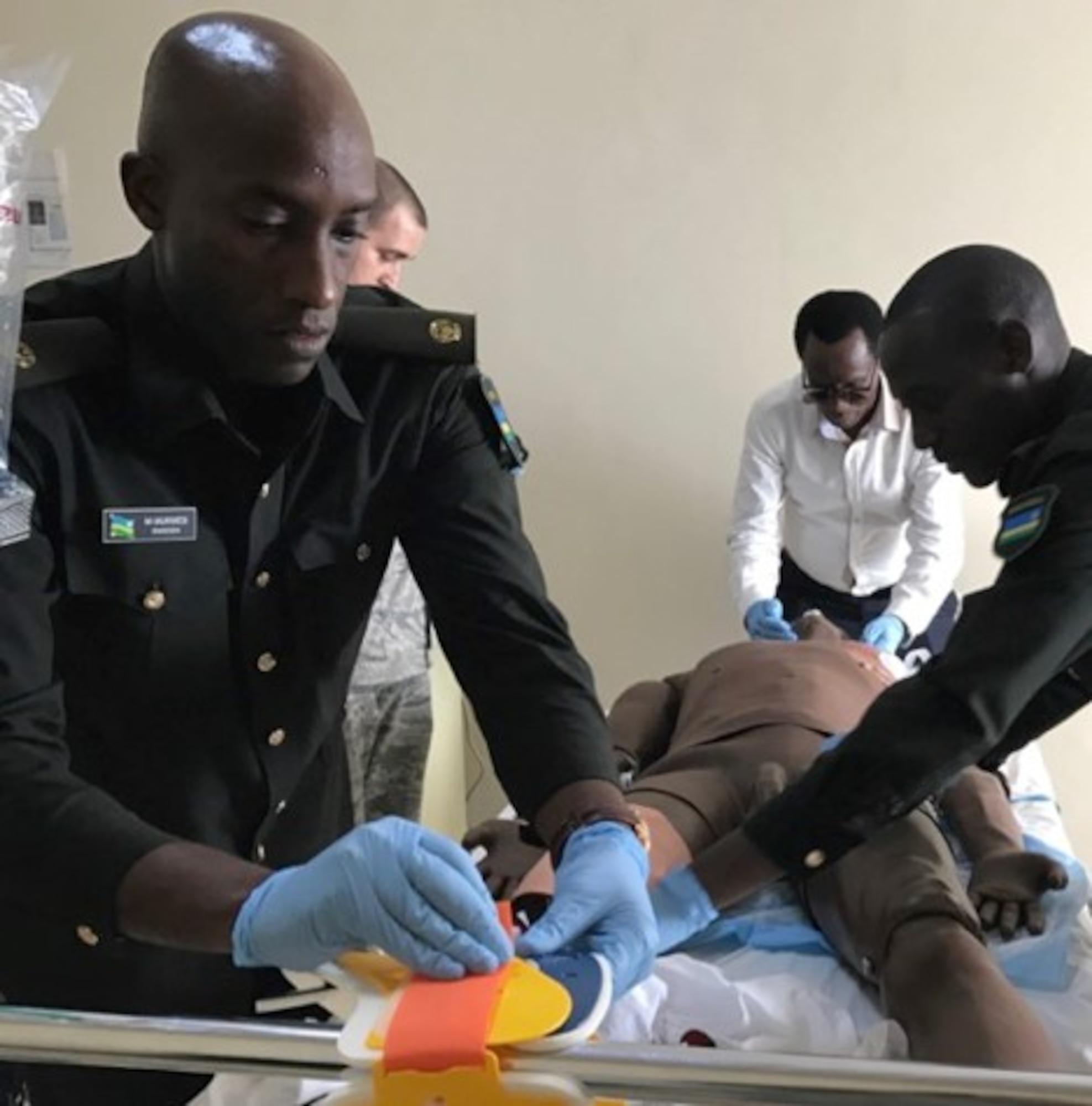 The Defense Institute of Medical Operations partnered with the Rwandan Defense Force last month for to complete phase three of a project to create Rwanda's first High Fidelity Medical Modeling and Simulation Center, located at the Rwandan Military Hospital. The medical simulation center will help equip military personnel with necessary skills to save the lives of peacekeepers injured while on U.N. missions, and will also serve as a tool to strengthen the general health system in the Rwanda. Over three weeks, the DIMO team certified 28 RDF personnel in International Trauma Life Support, and conducted “train the trainer” courses, so that six RDF personnel are now qualified as potential instructors. Subsequent training will include in-hospital care, and hopefully achieving status as an ITLS training center, allowing the RDF to fully train and certify others to use their newly acquired capability and capacity.
