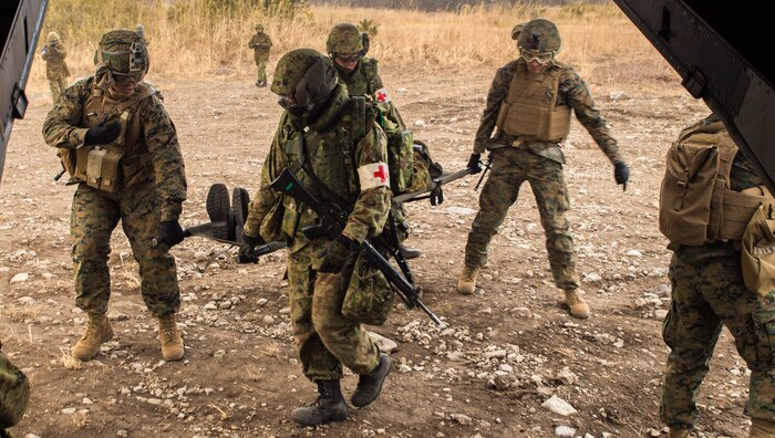 Marines and sailors with 2nd Battalion, 3rd Marine Regiment and members of the Japan Ground Self-Defense Force, 30th Infantry Regiment, 12th Brigade, Eastern Army practice casualty evacuation drills during Forest Light 17-1 at Camp Soumagahara, Mar. 9, 2017. Forest Light is a routine, semi-annual exercise conducted by U.S. and JGSDF in order to strengthen interoperability and combined capabilities in defense of the U.S.-Japan alliance.
